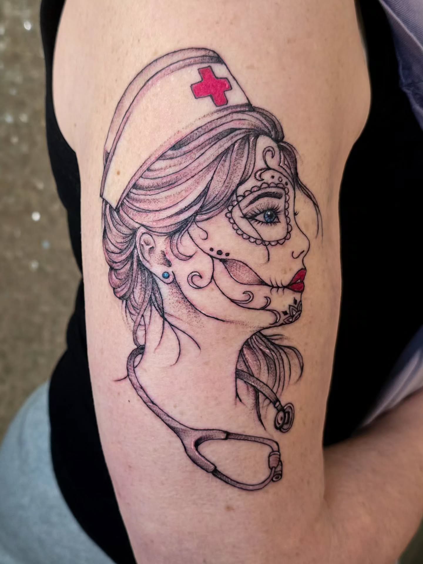 Nurse with sugar skull makeup American traditional tattoo on the forearm by Hope 🌙, Cincinnati