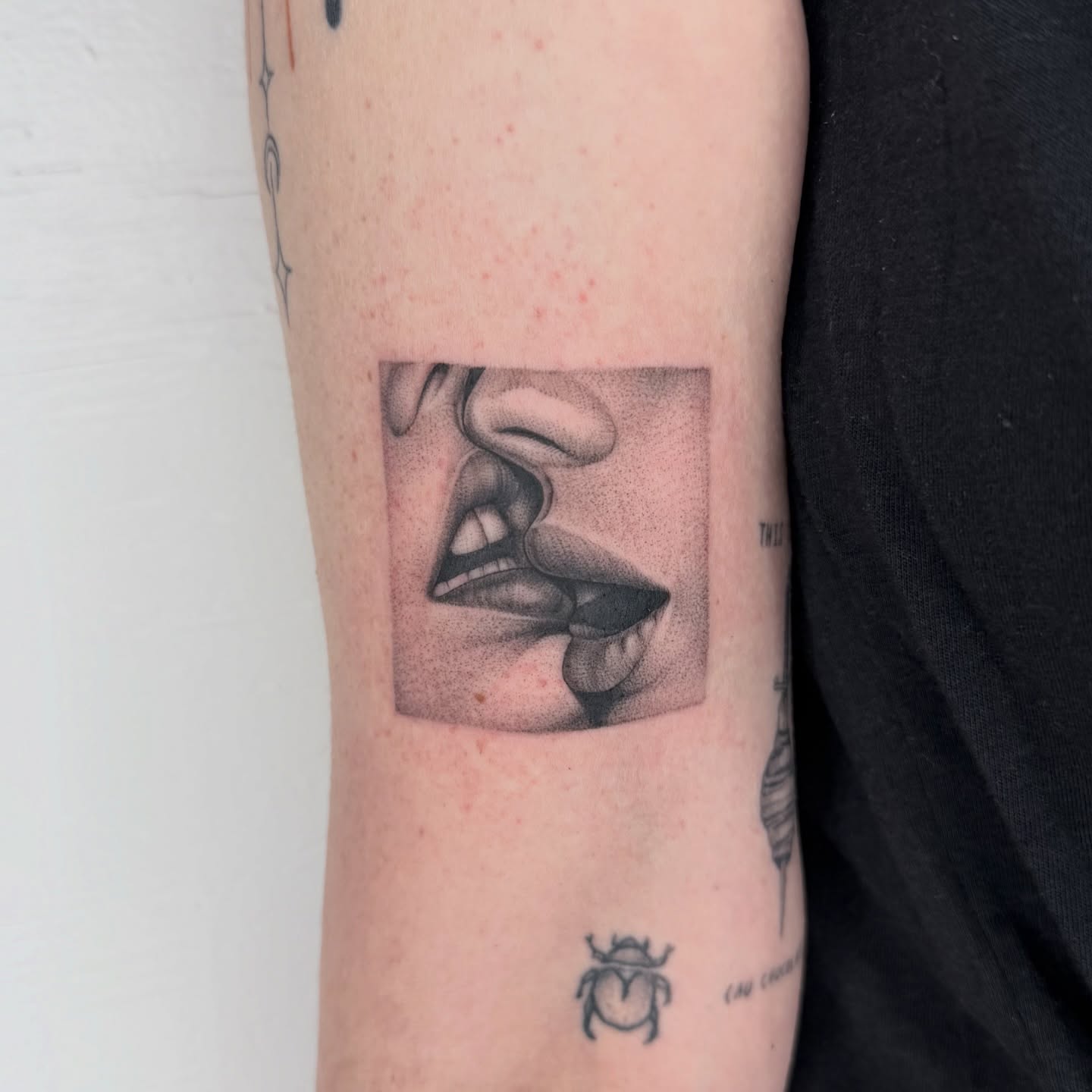 Lips dotwork tattoo on the forearm by Rose