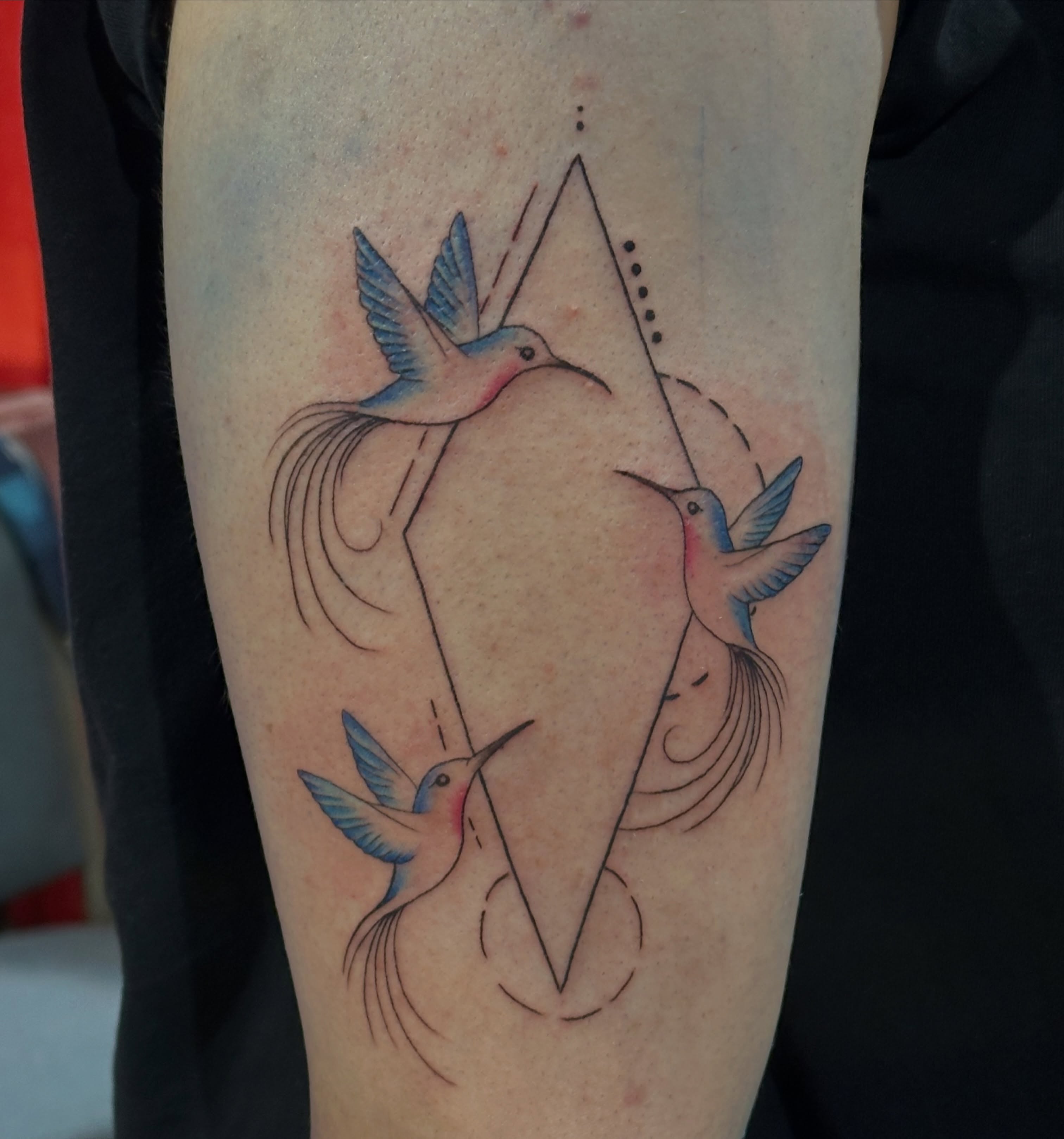 Hummingbirds geometric tattoo on the forearm by Persia Leilani