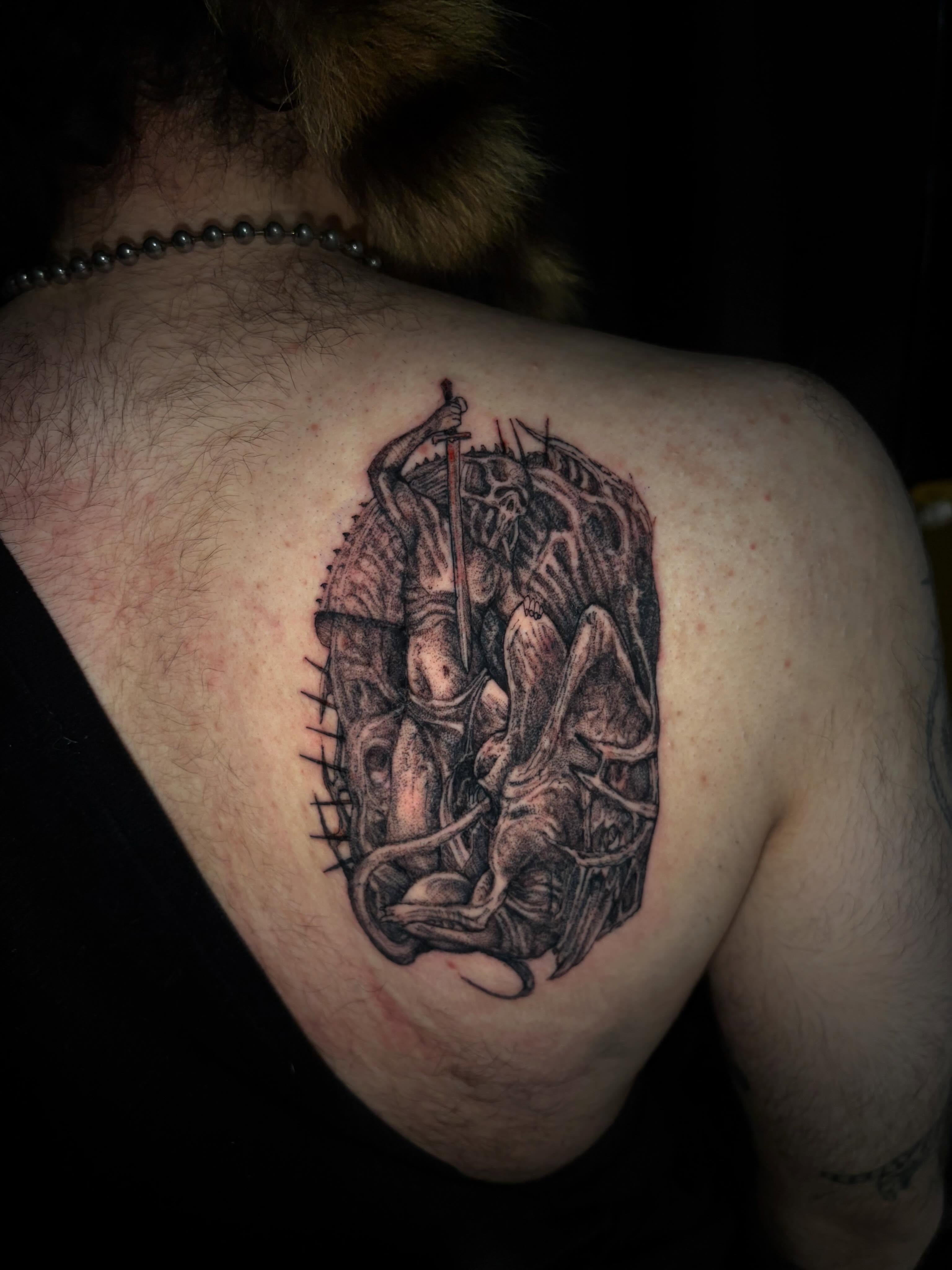Demon with sword realism tattoo on the shoulder by Crawlspacecadet