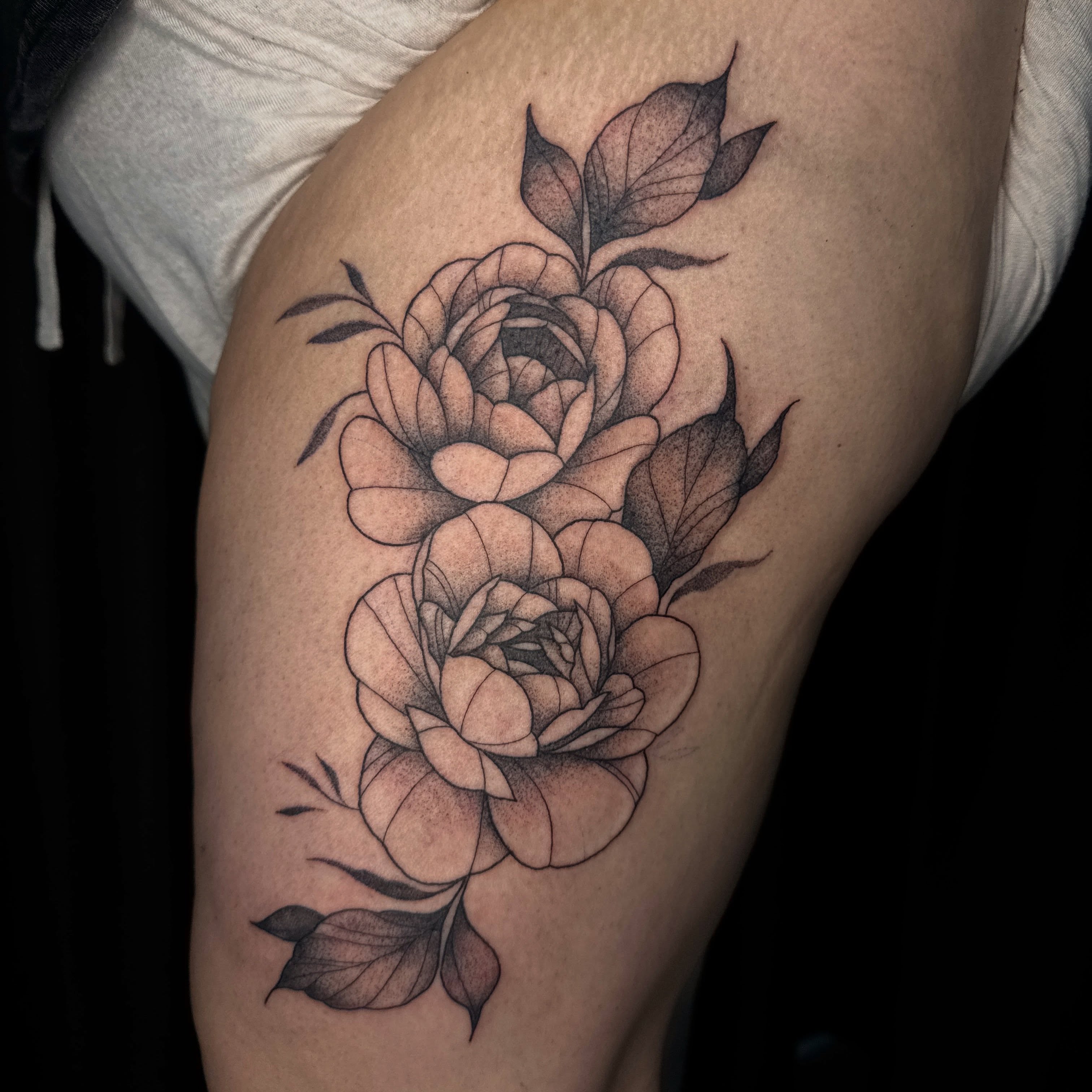 Peony flowers dotwork tattoo on the thigh by ✧˖°. Jordan