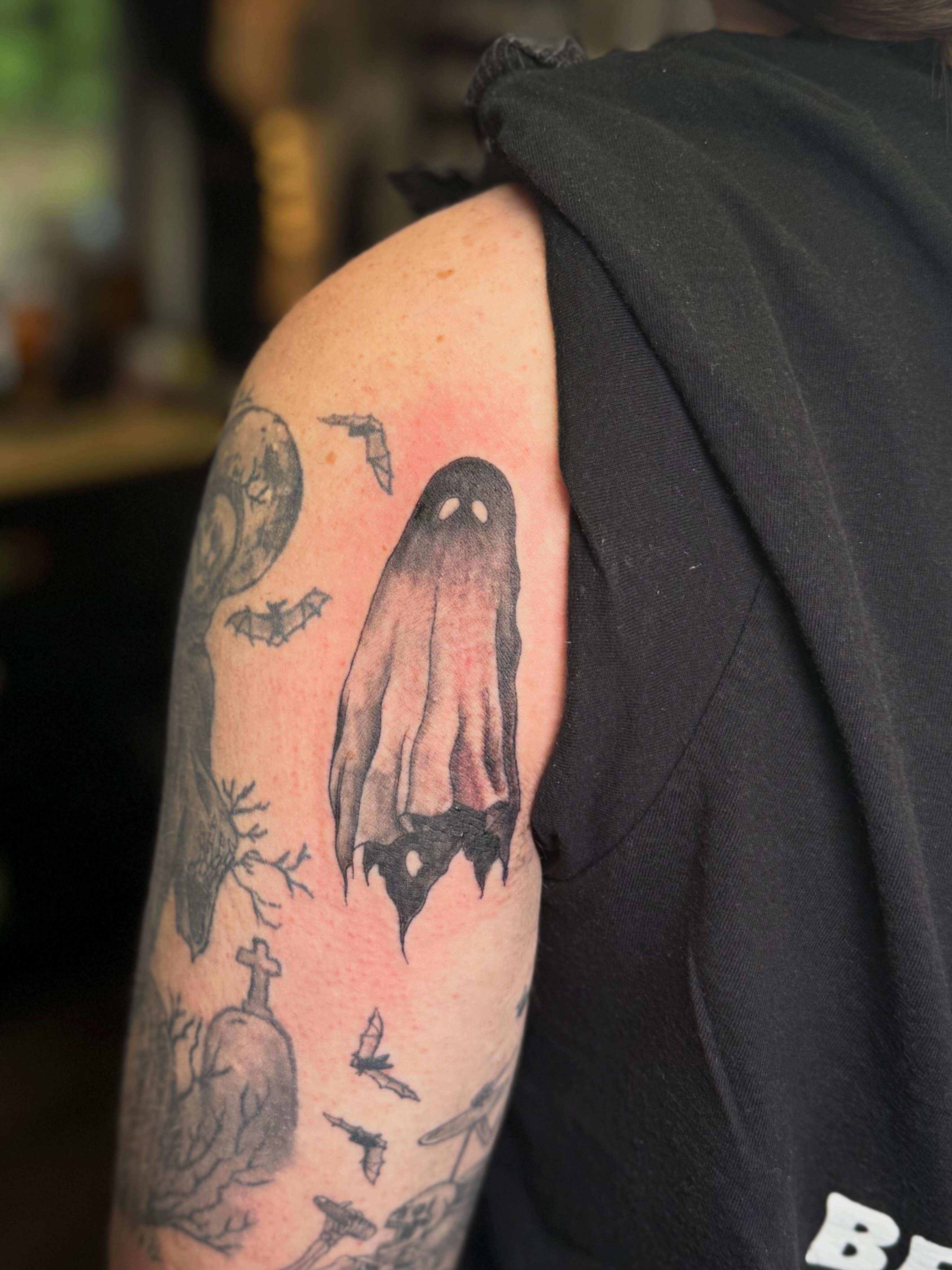 Ghost realism tattoo on the upper arm by βπ¬π―π’πΆ