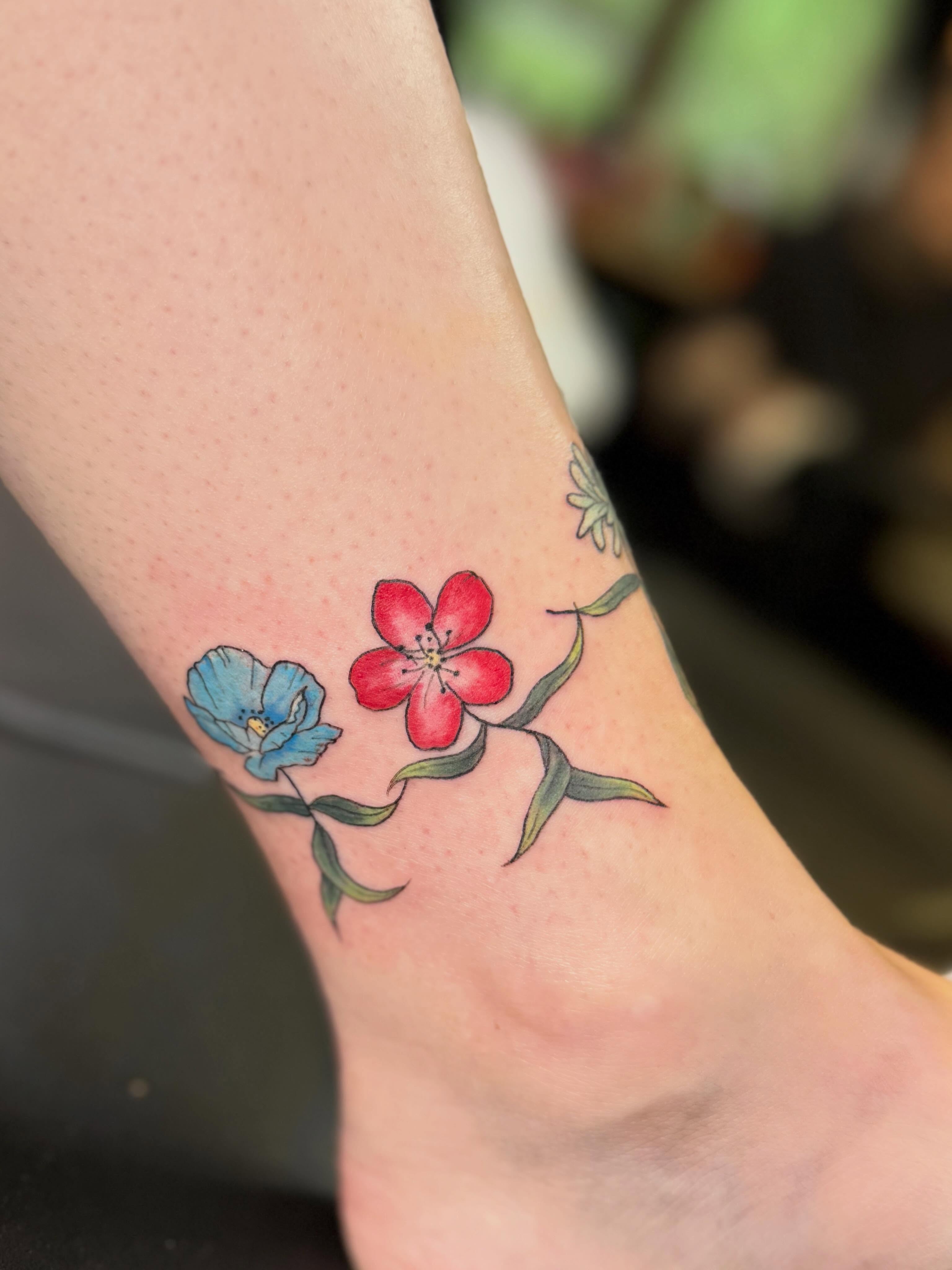 Flowers realism tattoo on the forearm by βπ¬π―π’πΆ