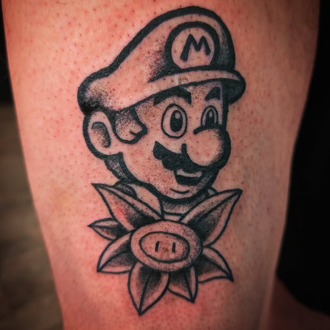 Mario and Piranha Plant new school tattoo on the thigh by Matt Mahl