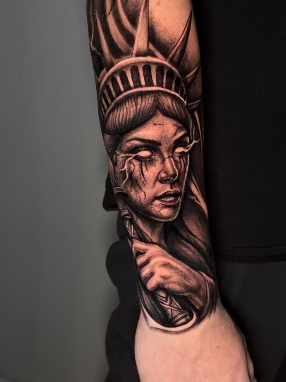 Tattoo by @burkes.body.graphic — realism, black_and_grey