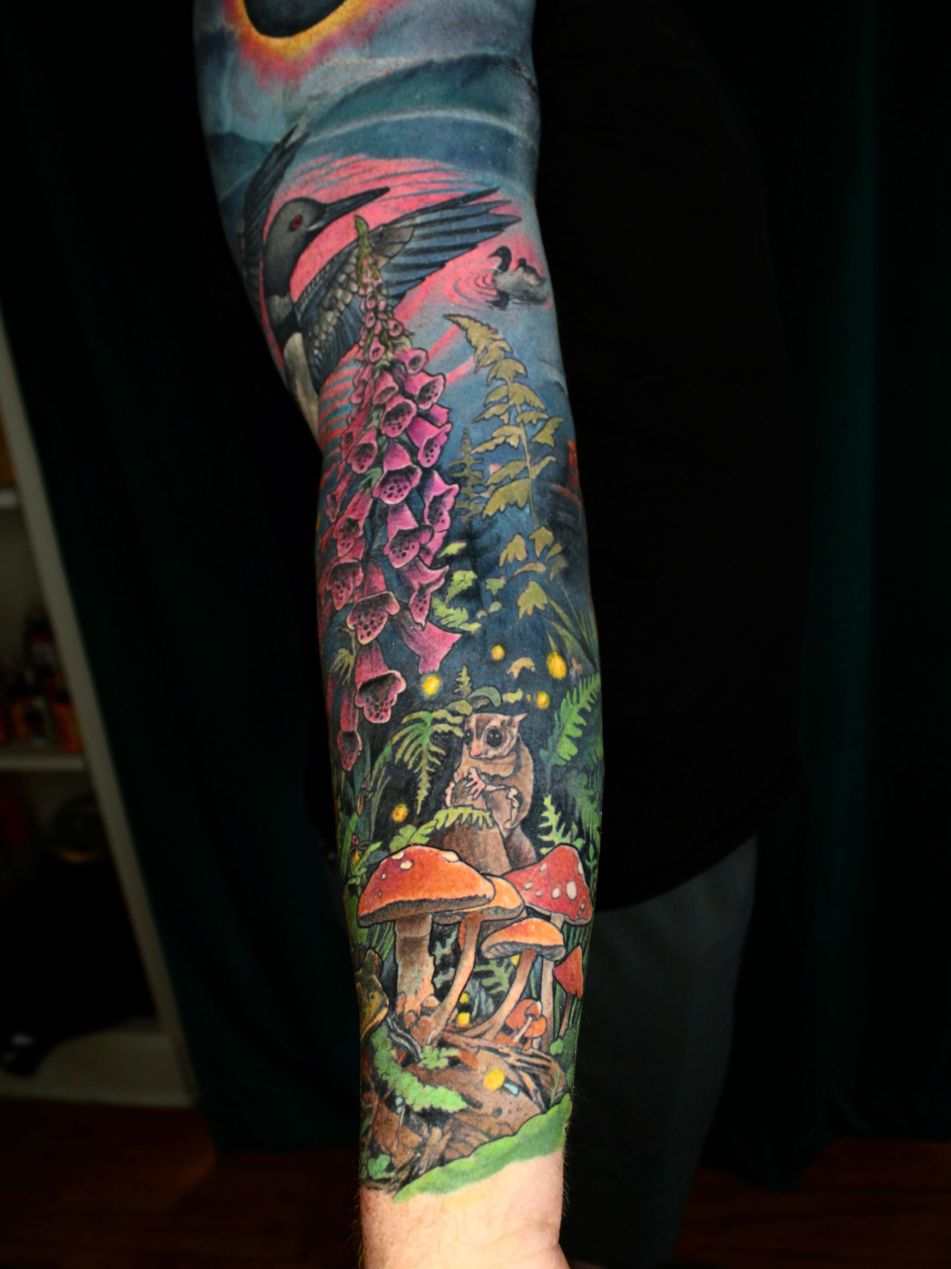 Forest scene illustrative tattoo on the forearm by Ericksen Linn
