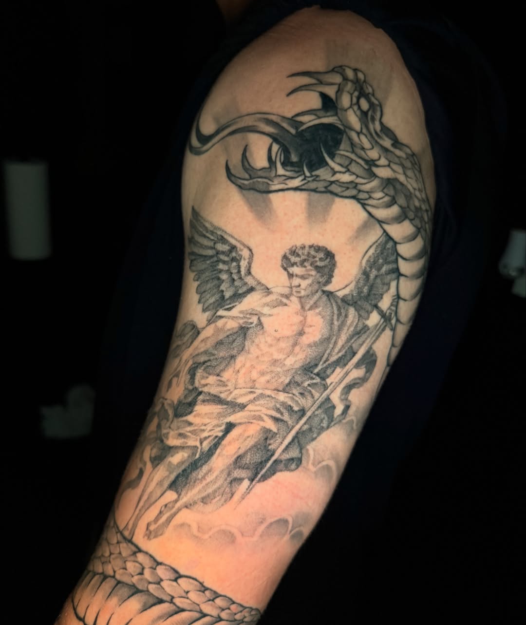 Angel with sword realism tattoo on the forearm by Exploitedtattoos