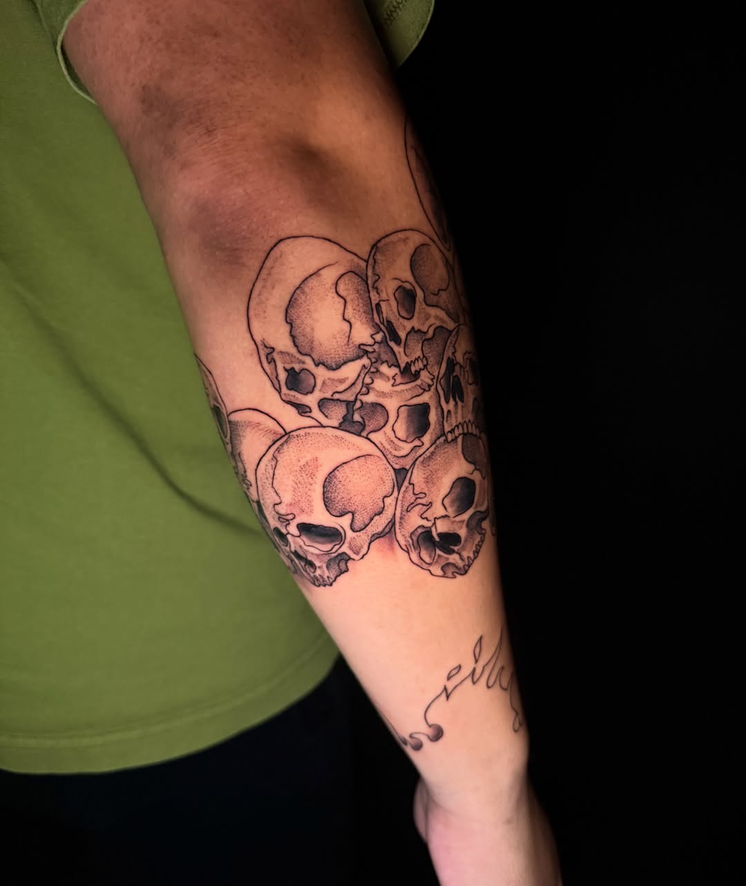 Skulls dotwork tattoo on the forearm by Exploitedtattoos