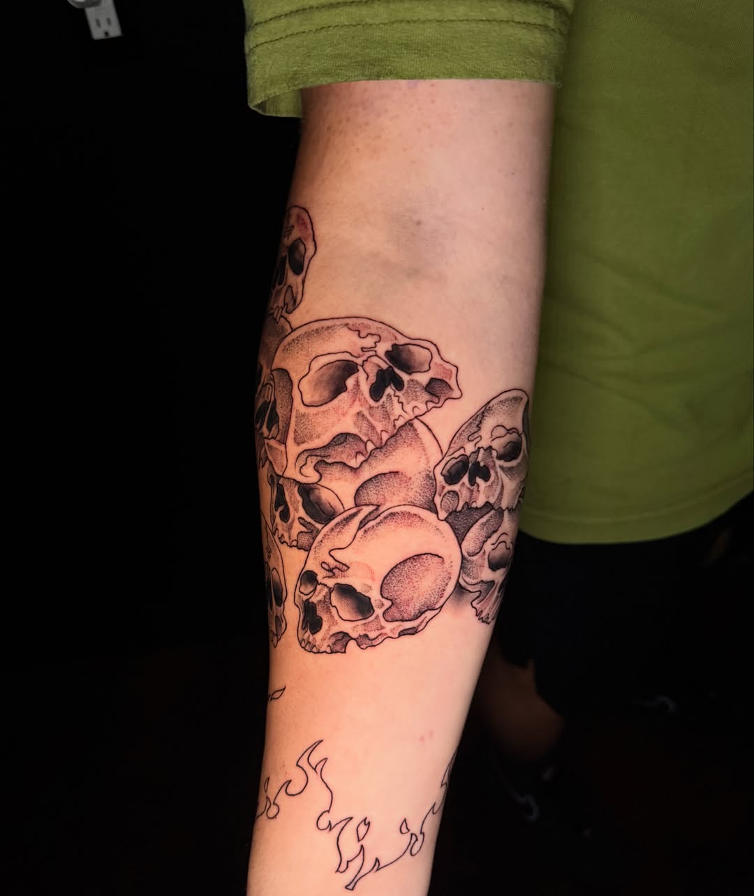 Skulls black and grey tattoo on the forearm by Exploitedtattoos