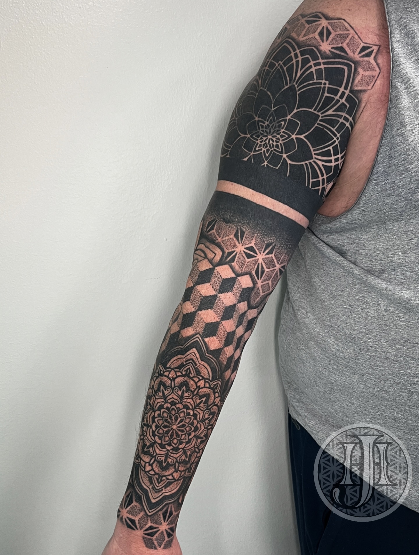 Geometric mandala geometric tattoo on the forearm by Jordan Hunt