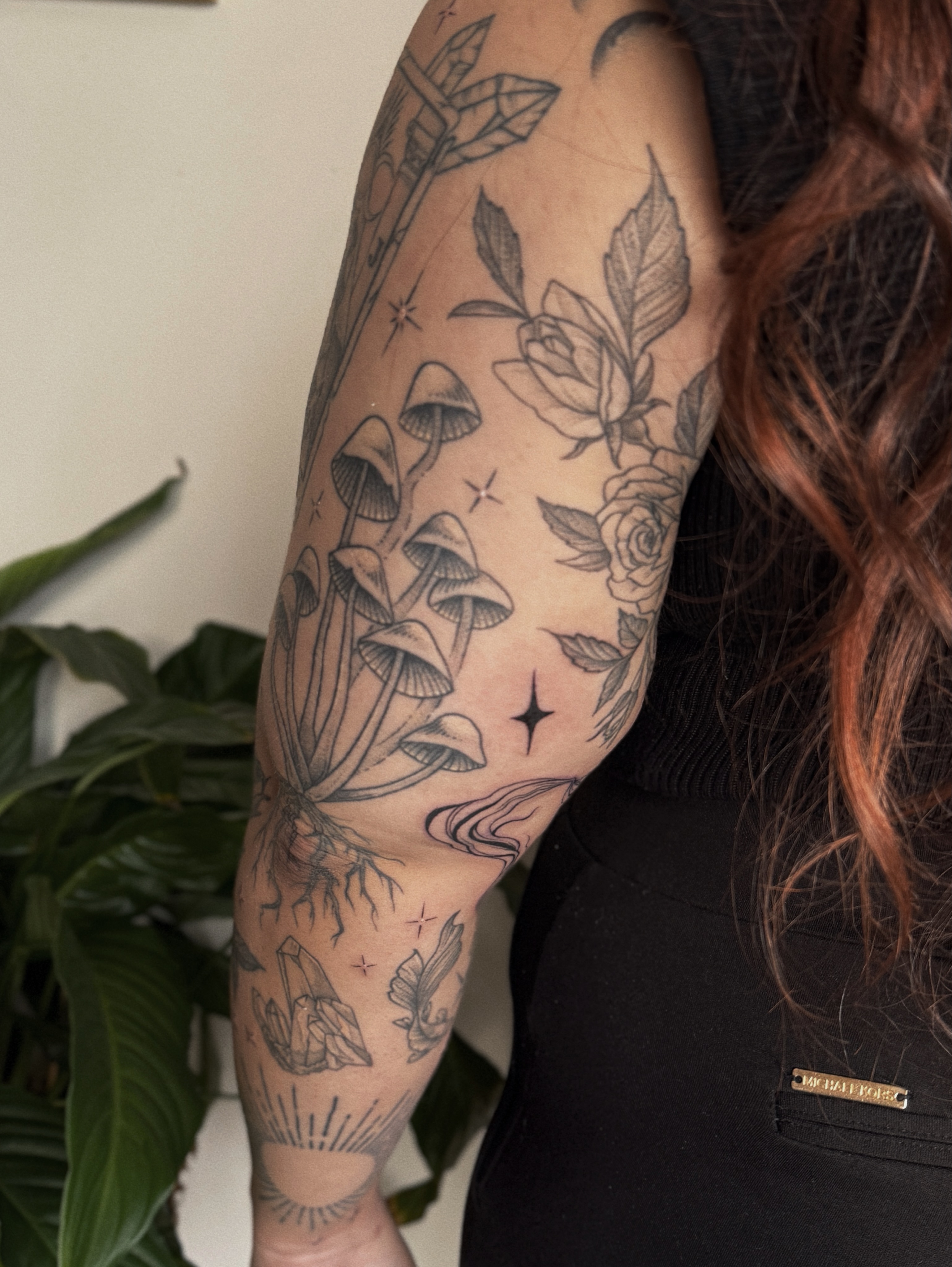 Mushrooms and roses black and grey tattoo on the forearm by 𝕵𝖊𝖘𝖘𝖎𝖈𝖆 𝕰𝖑 (raleigh tattoo artist)