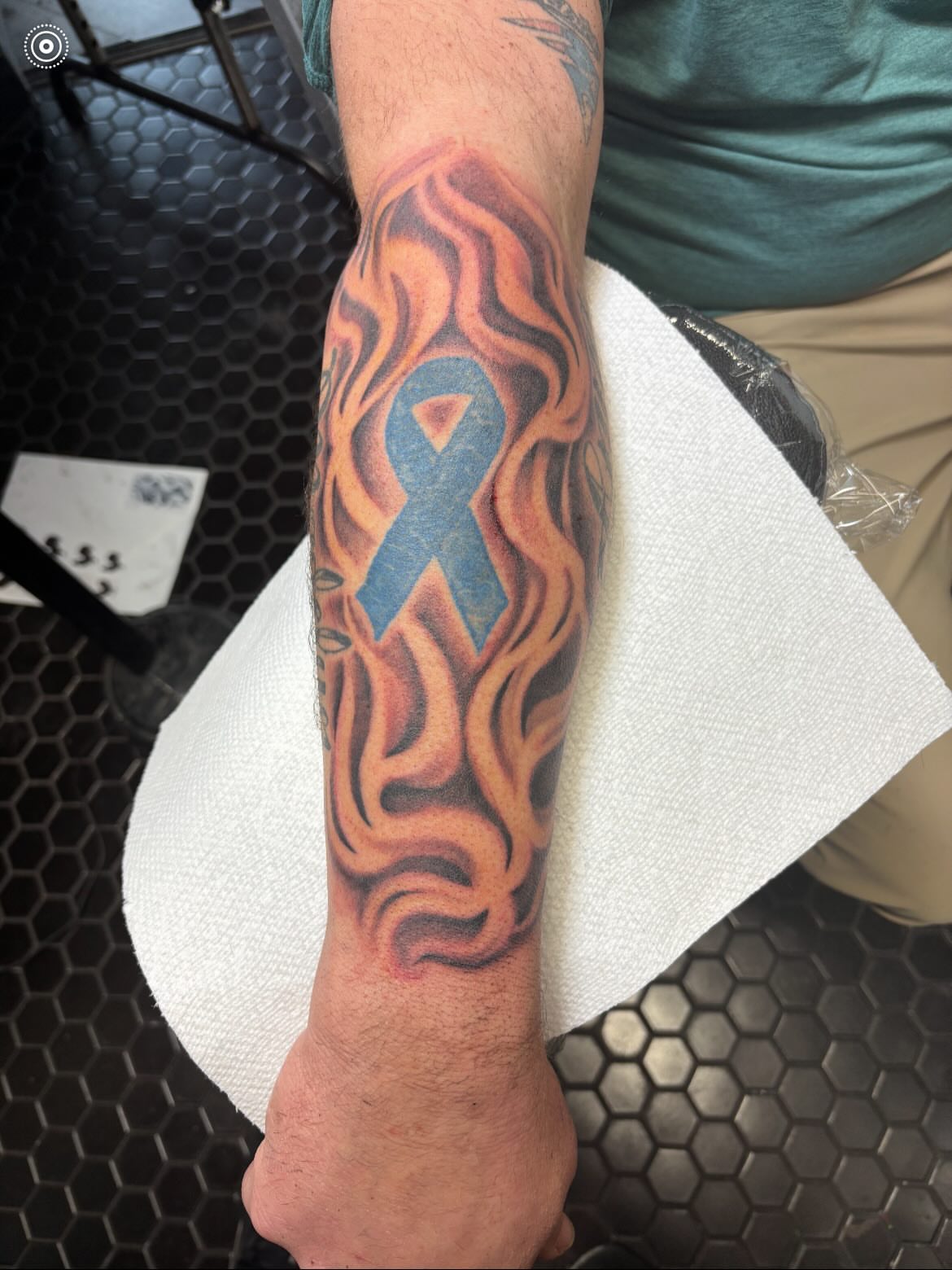 Flame with ribbon neo-traditional tattoo on the forearm by Scottbarrytattoos@gmail.com