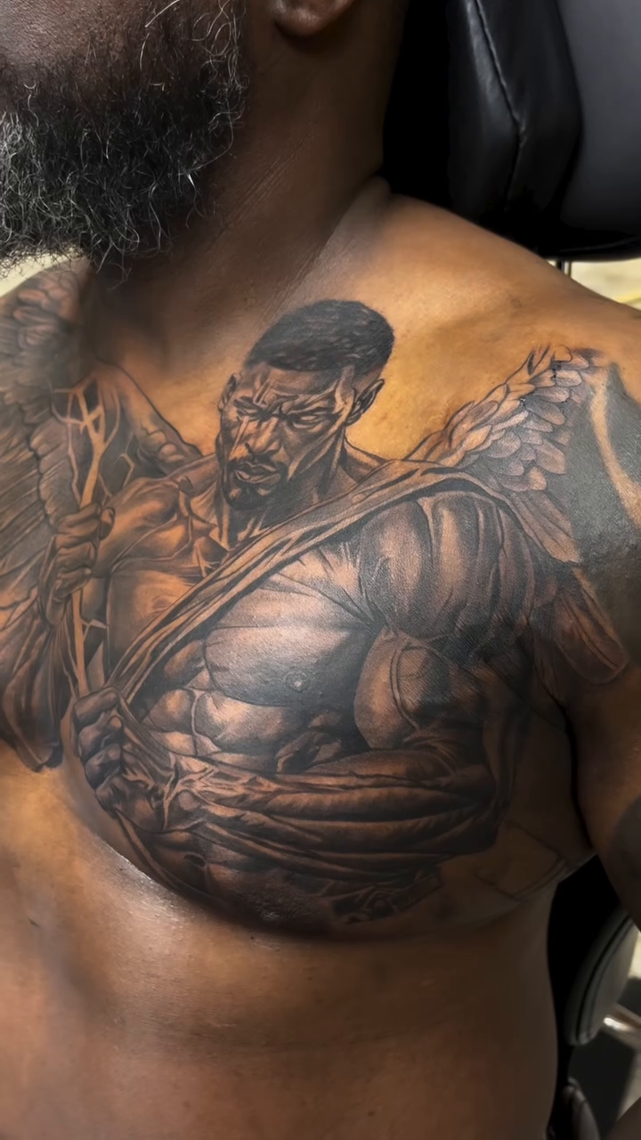 Warrior with wings realism tattoo on the chest by Quinten Harper