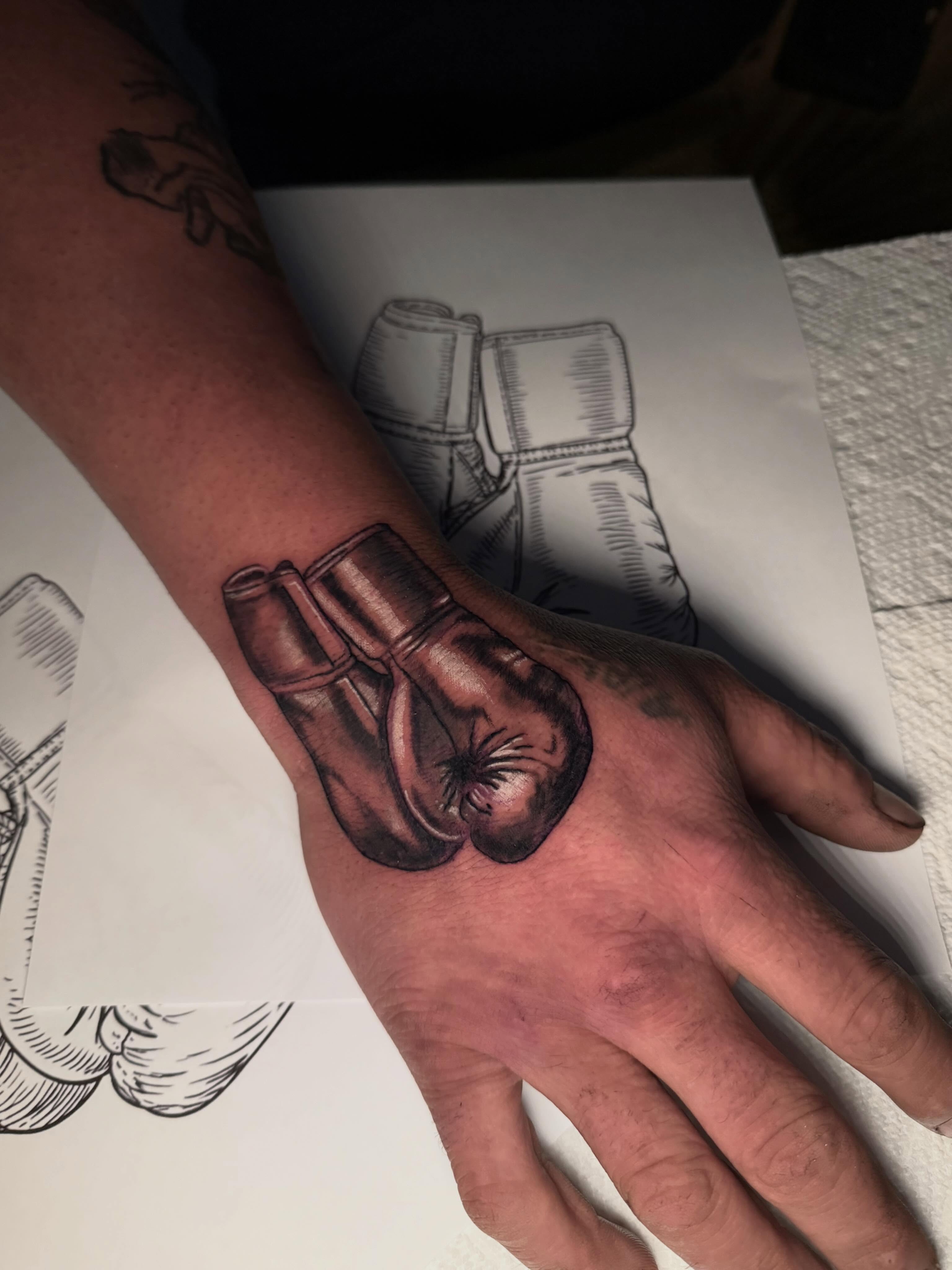 Boxing glove realism tattoo on the hand by 𝕸 𝖆 𝖓 𝖔 𝖑 𝖔