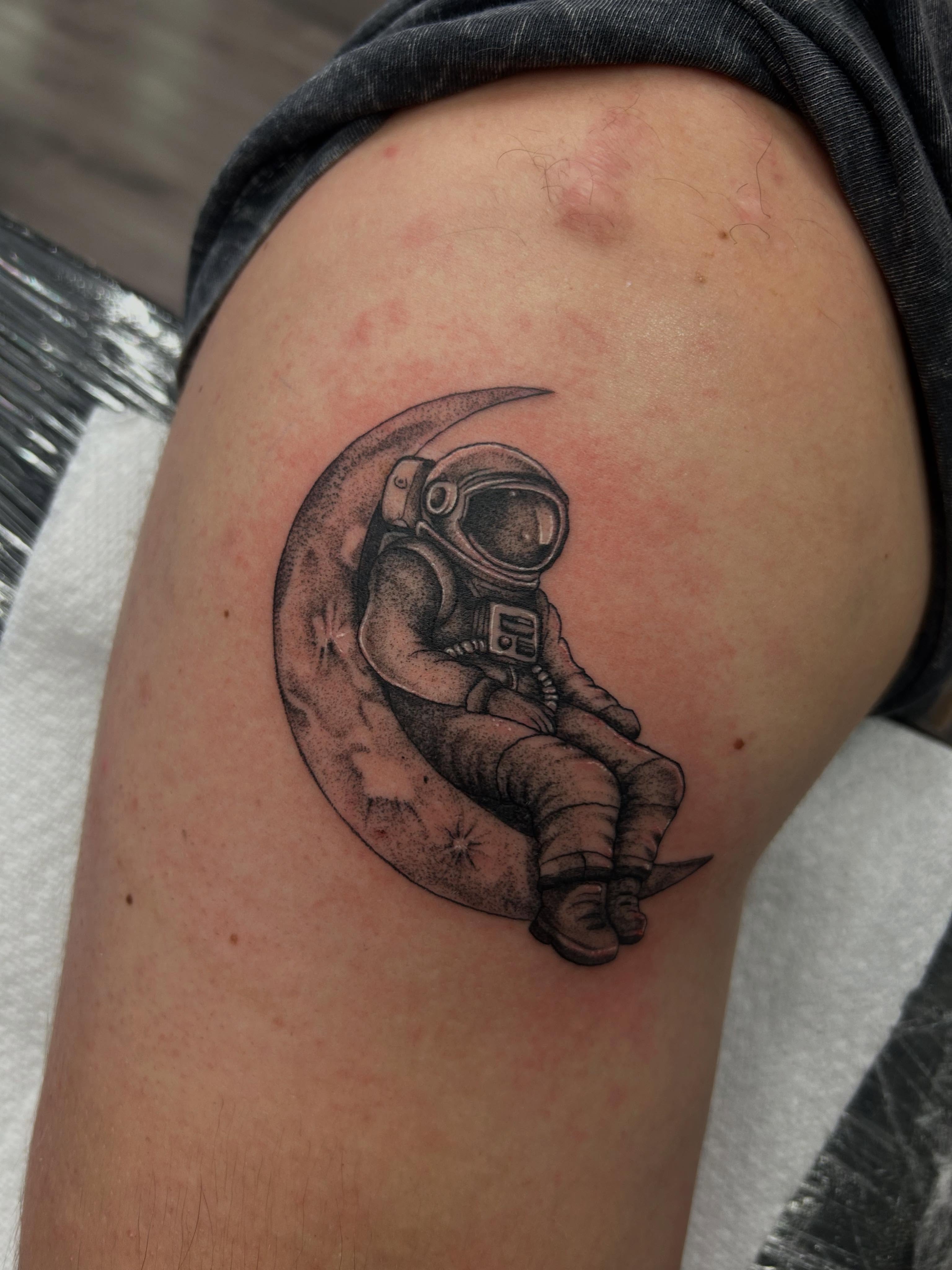 Astronaut dotwork tattoo on the thigh by Livy baby