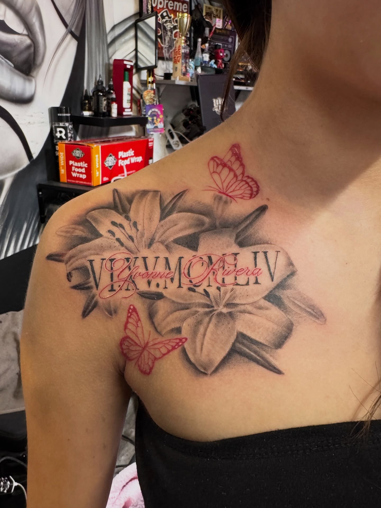 Lilies and butterflies realism tattoo on the shoulder by πΎππππππππ