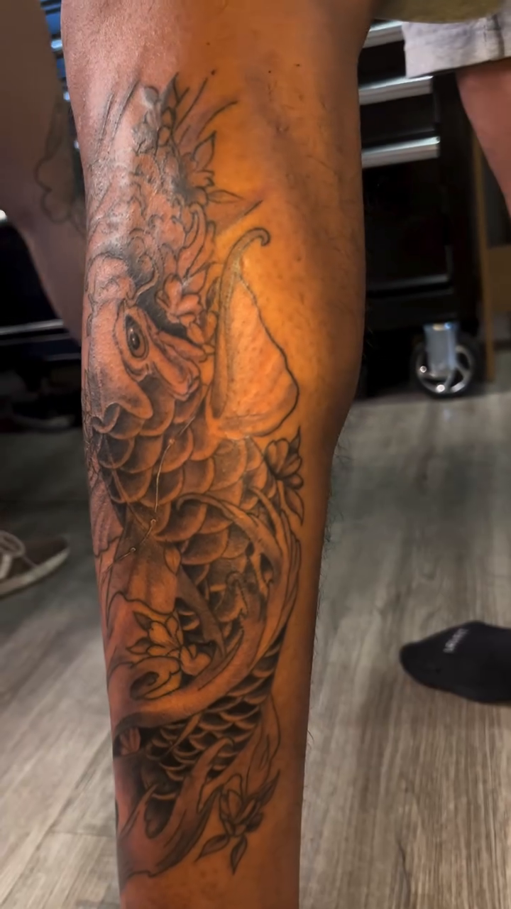 Koi fish tattoo on leg Japanese tattoo on the calf by Oto_art