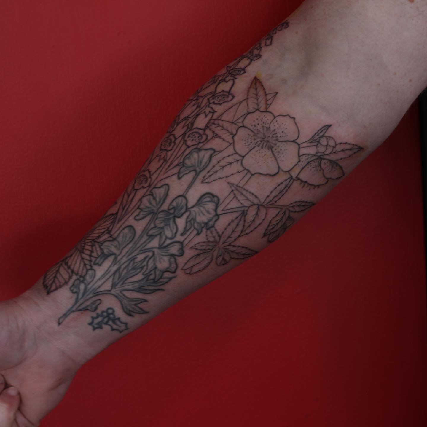 Floral arrangement black and grey tattoo on the forearm by adrienne mae ❀