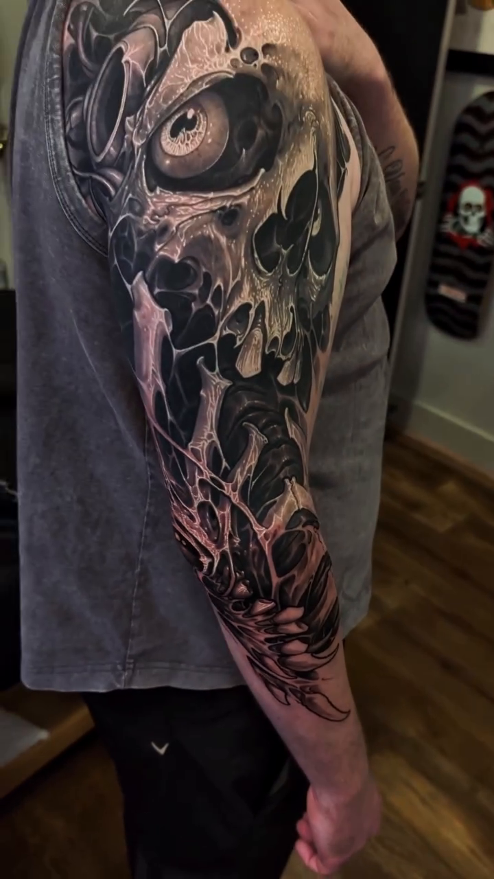 Tattoo by @raptorlazer — dark_realism, black_and_grey