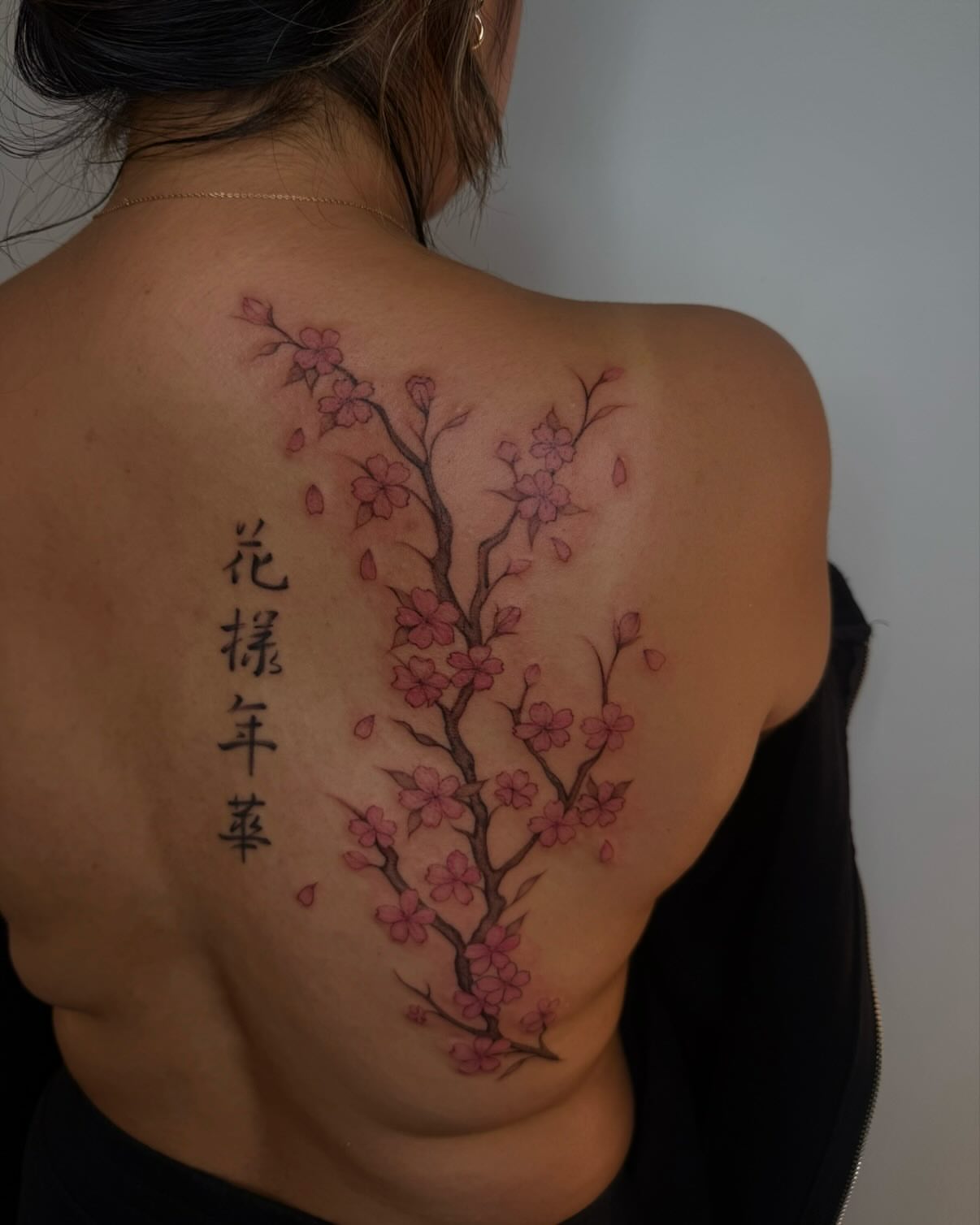 Cherry blossom tree realism tattoo on the back by Carson Mccullers ✨