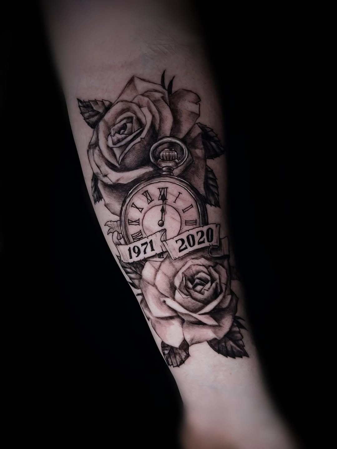 Pocket watch and roses with dates realism tattoo on the forearm by Saint