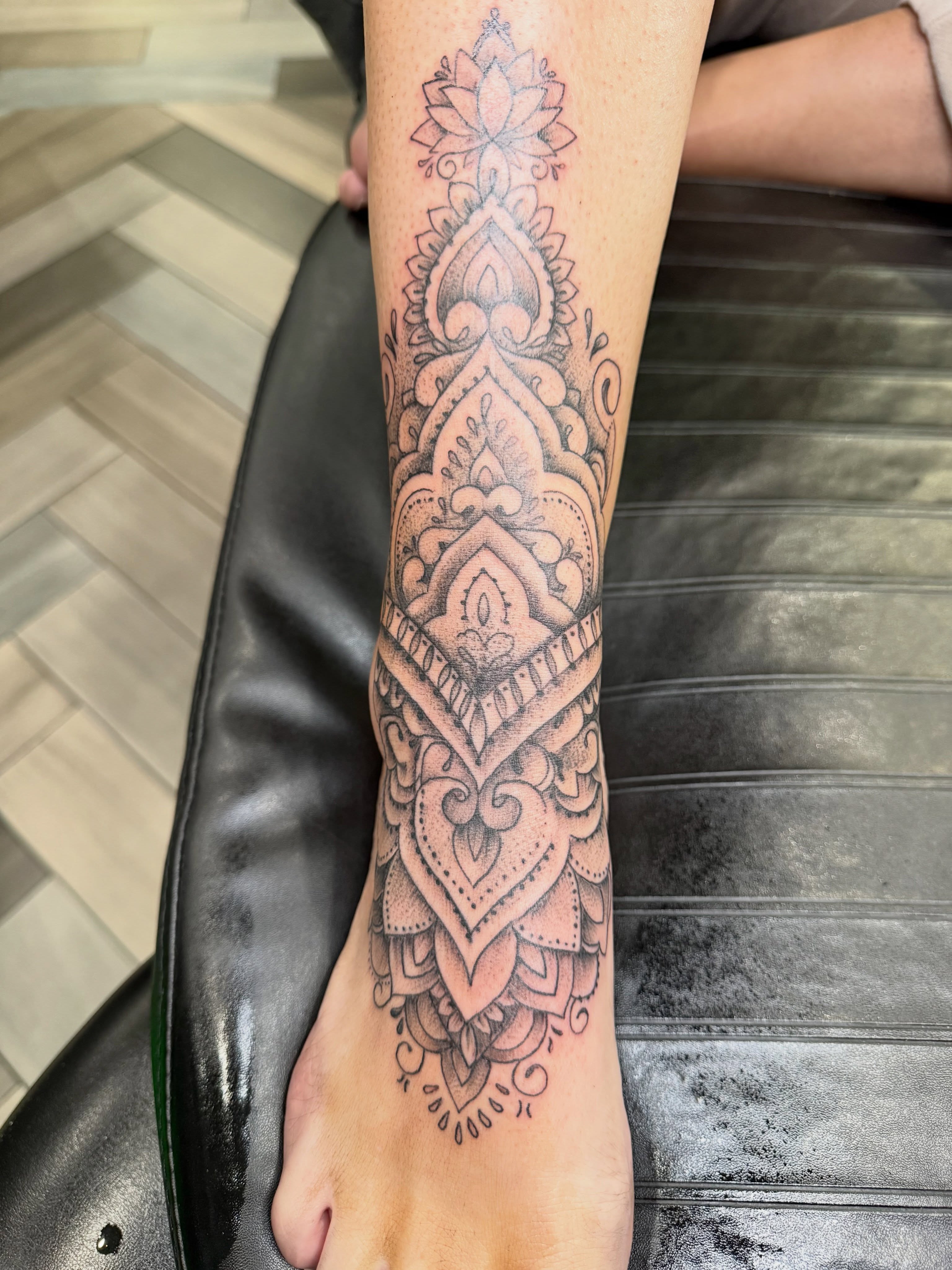 Lotus mandala ornamental tattoo on the foot by Dave Potavin, Erlanger, Kentucky