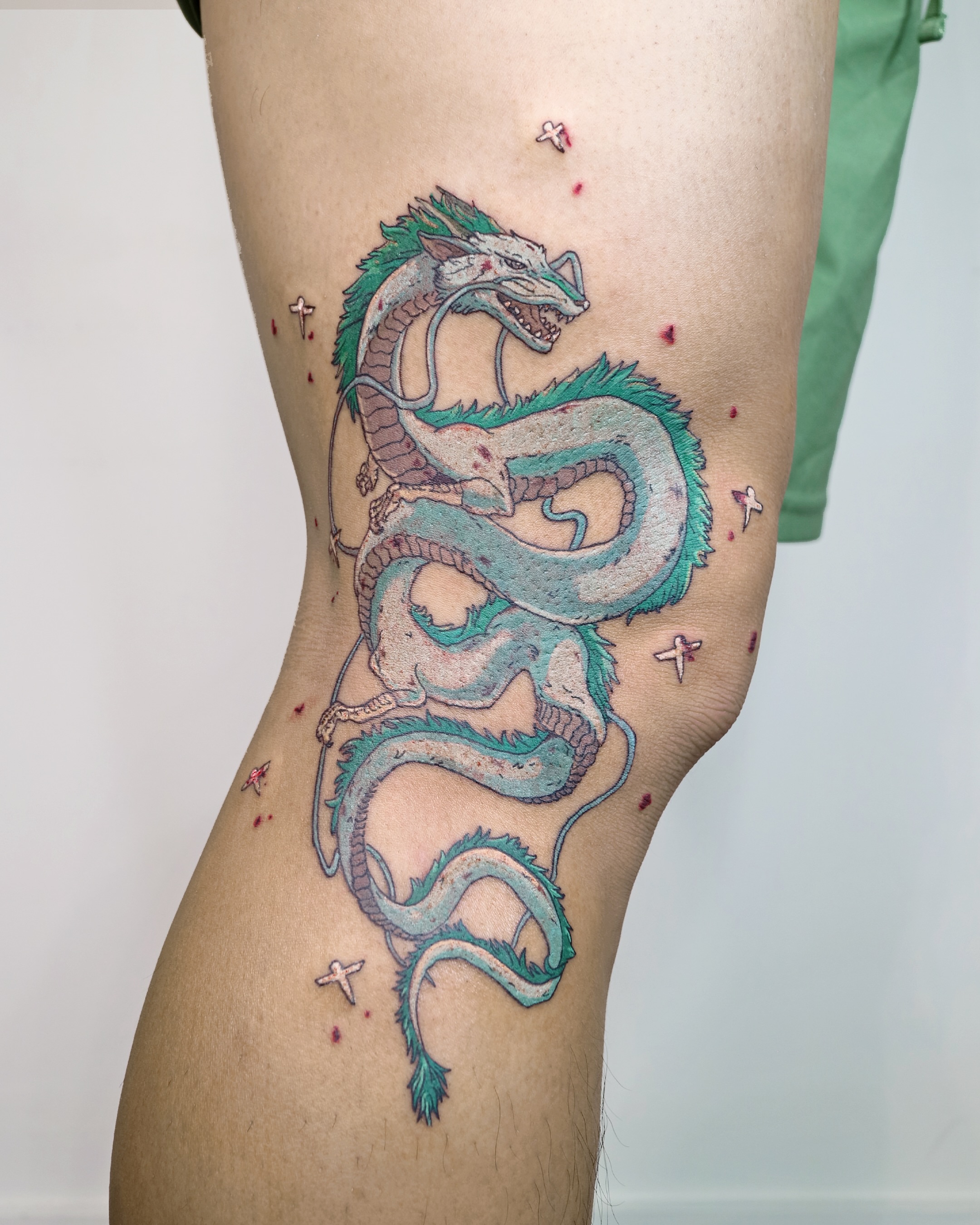 Dragon dotwork tattoo on the thigh by Aroha