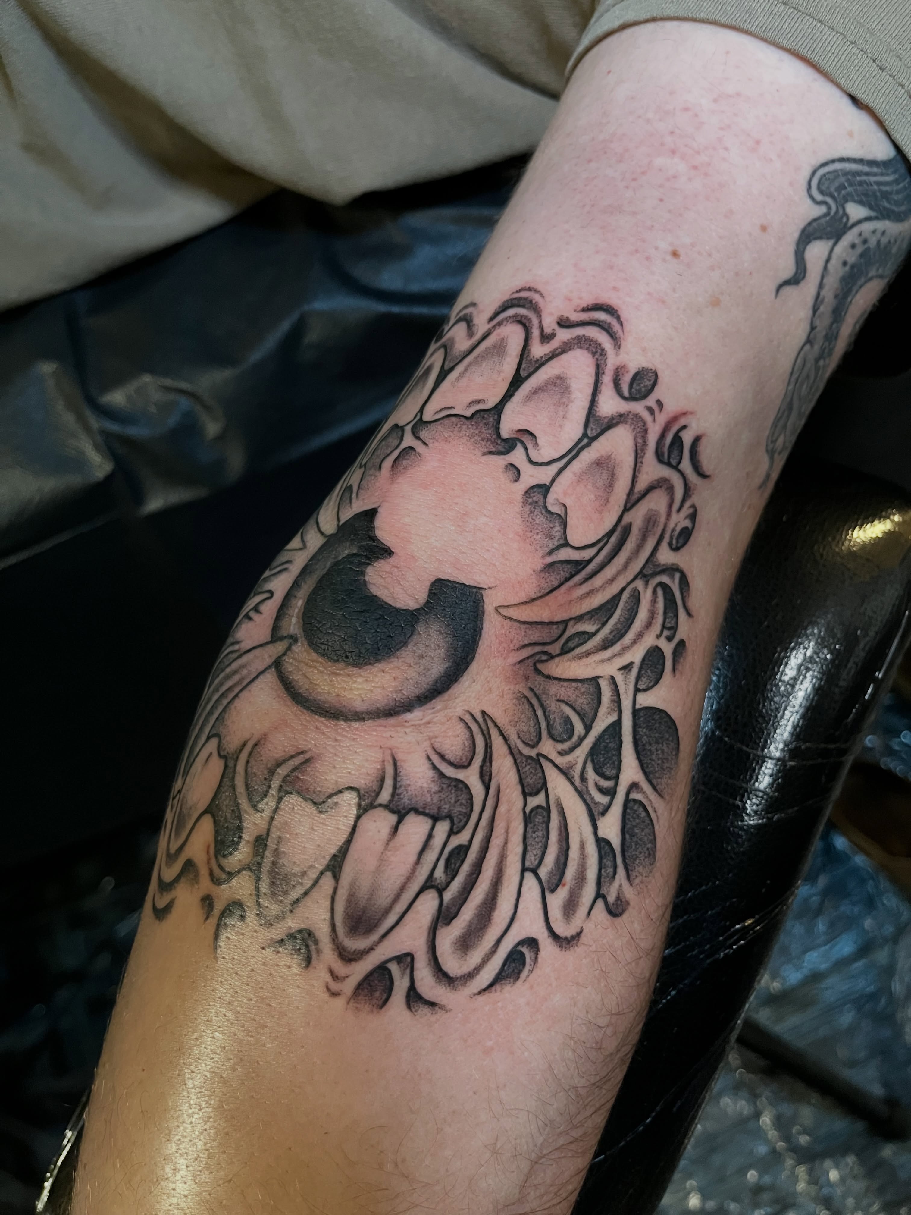 Floral black and grey tattoo on the forearm by Campbell Zane Alexander