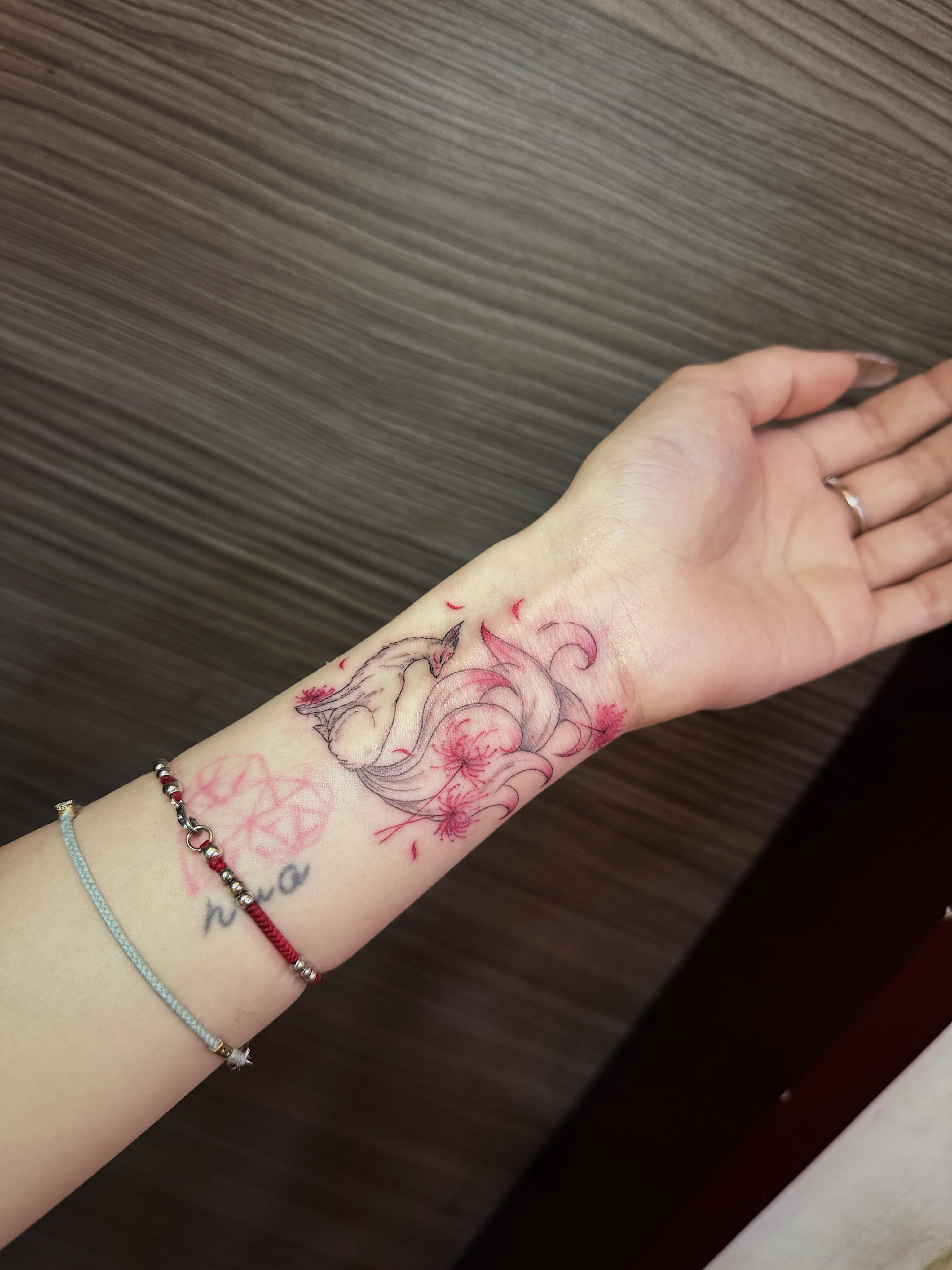 Bird and flowers watercolor tattoo on the forearm by 墨匠紋身|新店店, New Taipei City
