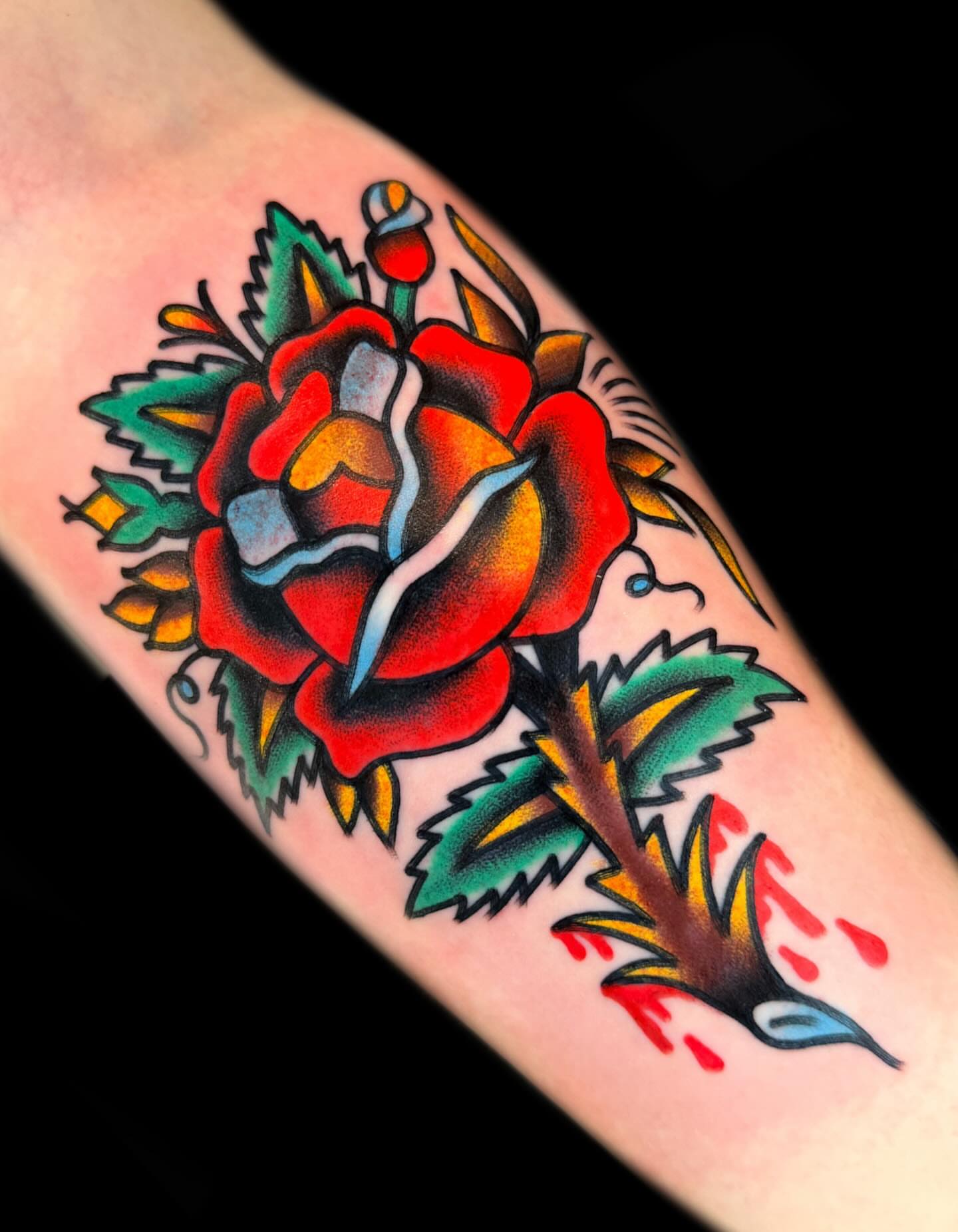 Rose American traditional tattoo on the forearm by The Calamari Kid