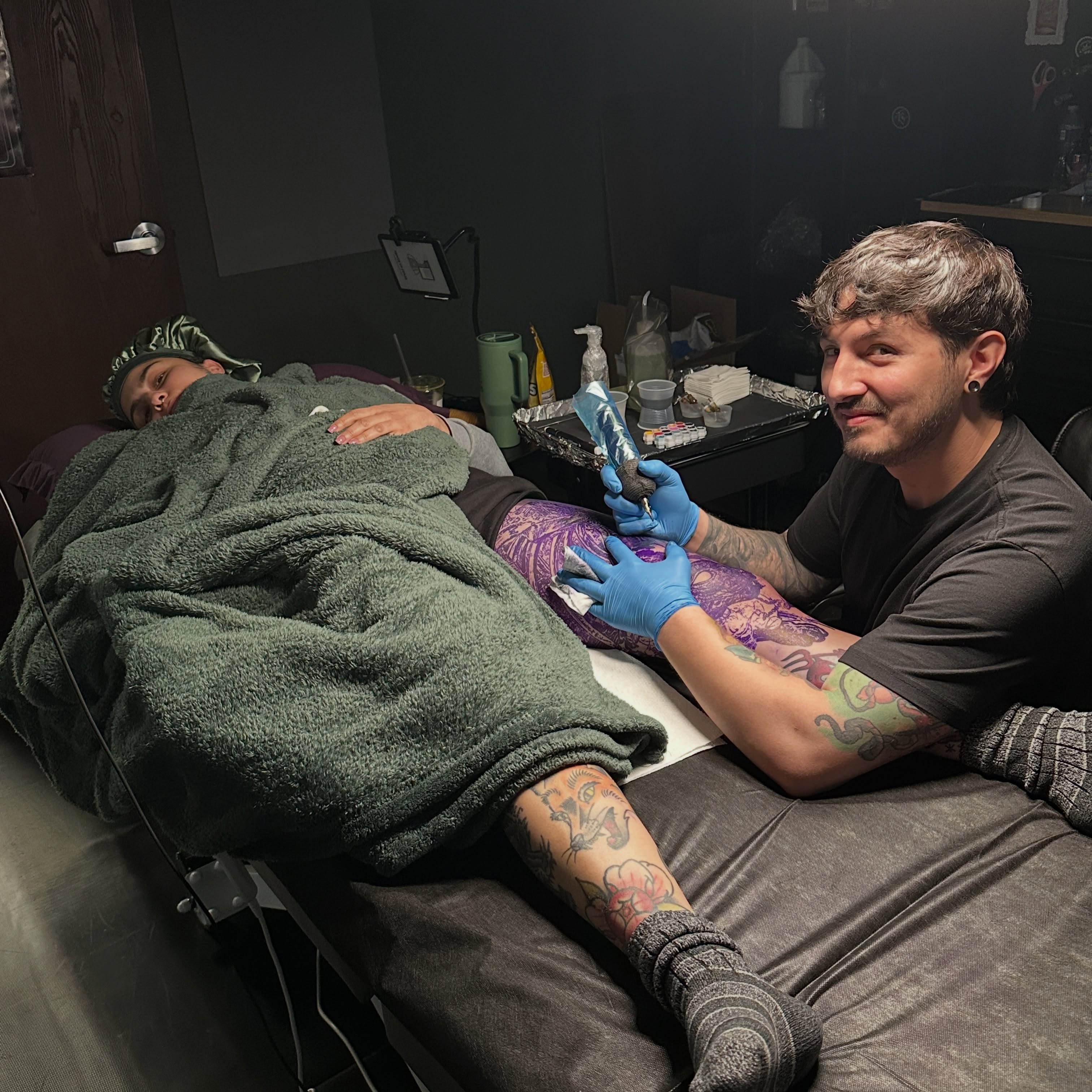 Floral design American traditional tattoo on the leg by Jason