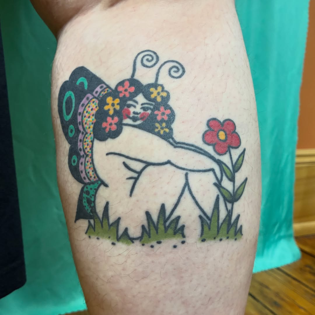 Butterfly new school tattoo on the thigh by Kaily McKee