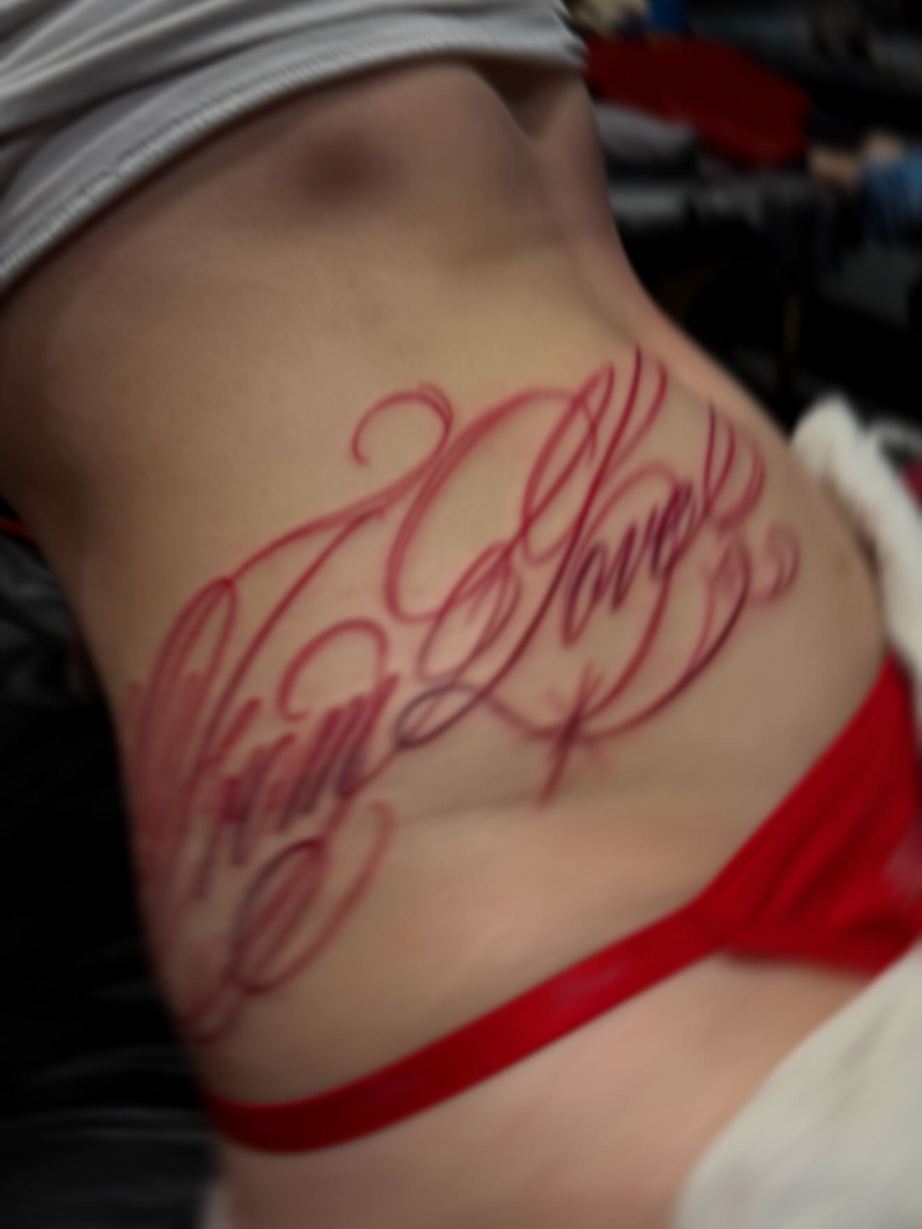 Script lettering lettering script tattoo on the ribs by Yvonne