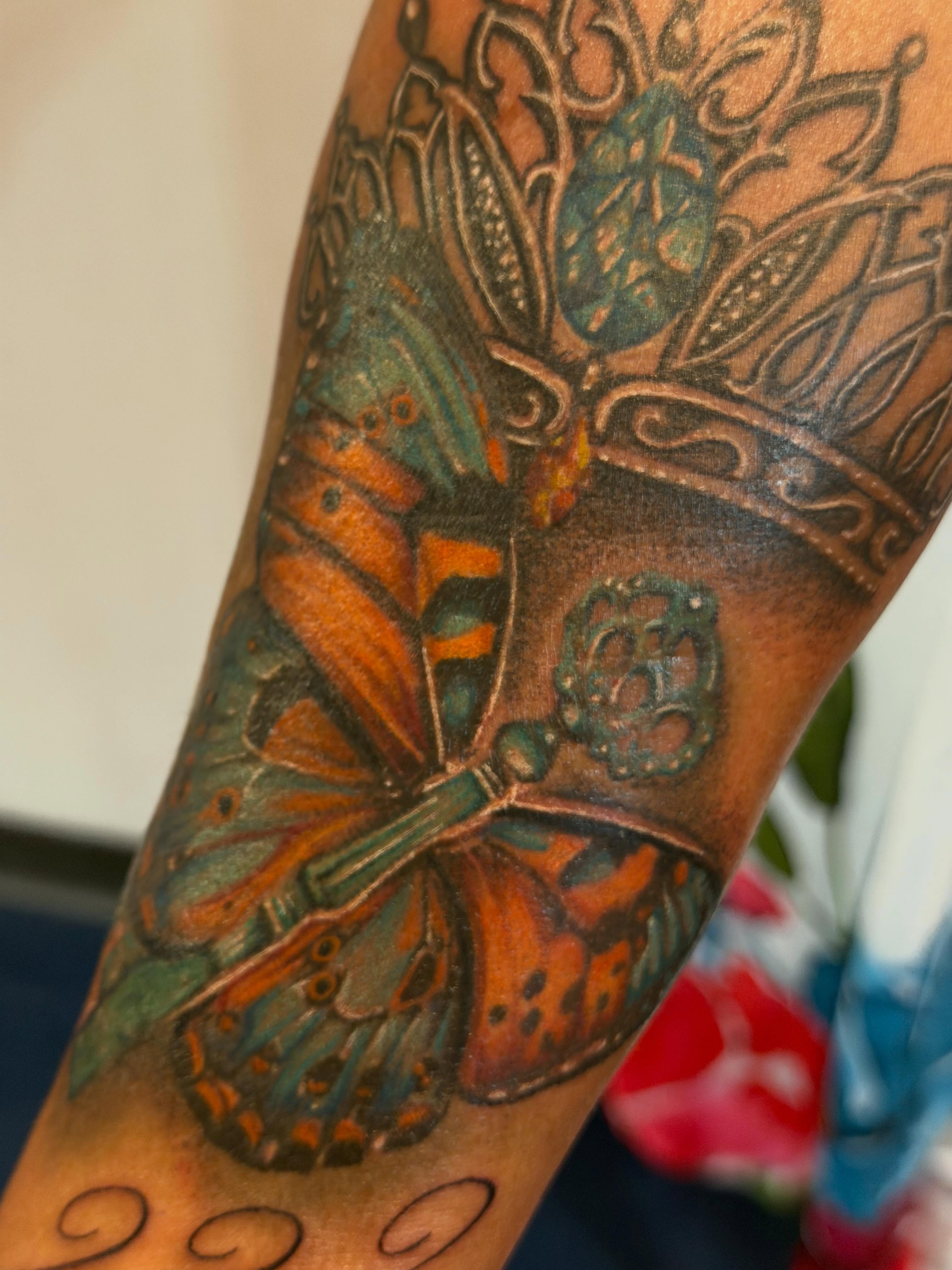 Butterfly realism tattoo on the forearm by Yvonne