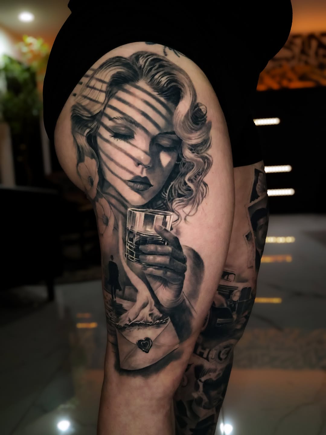 Realism tattoo on the upper arm by angel.antonio.tattoos