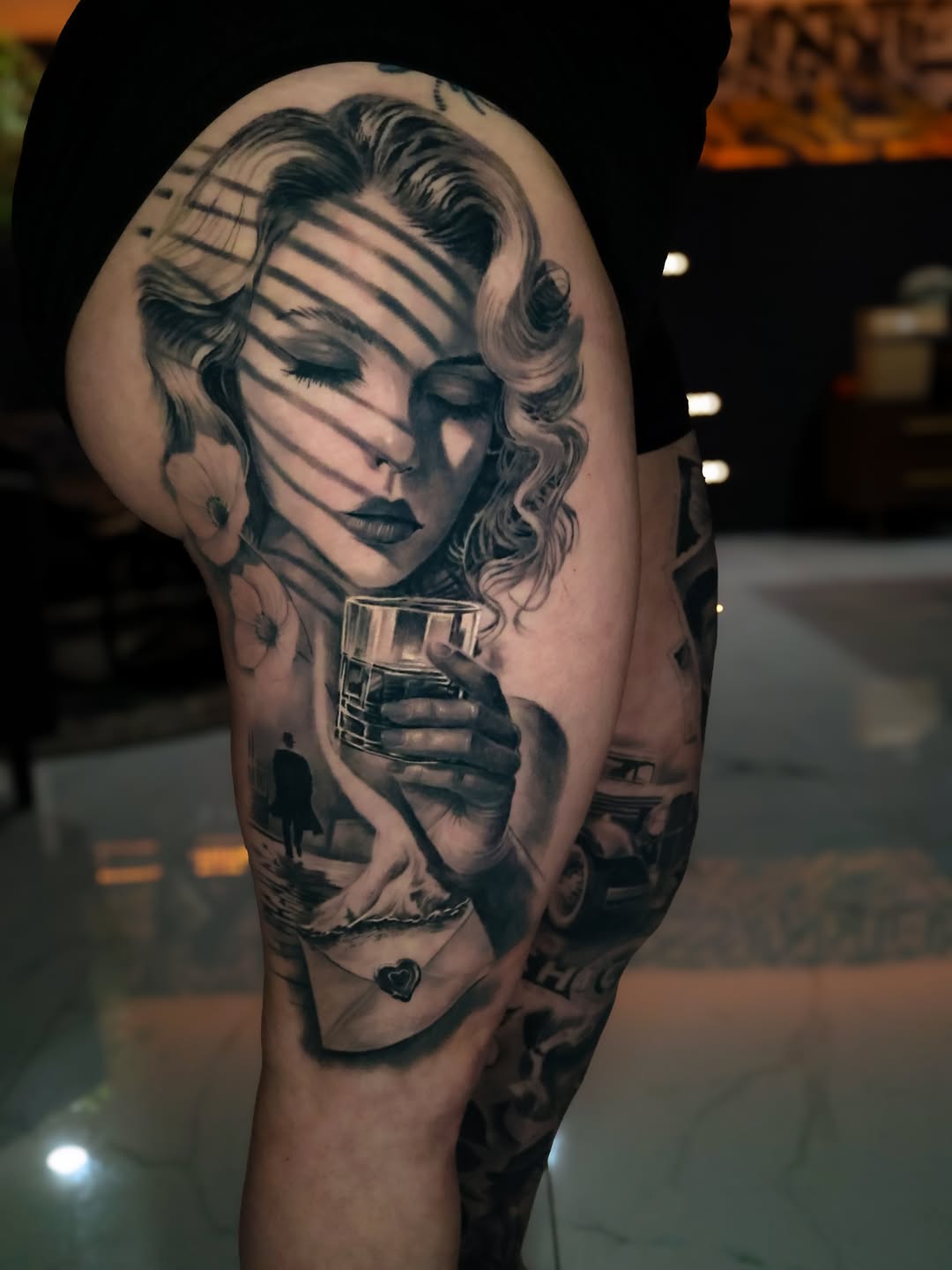 Realism tattoo on the thigh by angel.antonio.tattoos