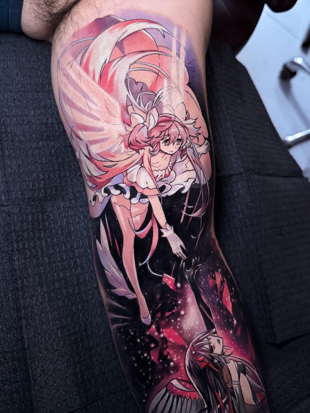 Anime character with wings anime tattoo on the forearm by Alex Moro