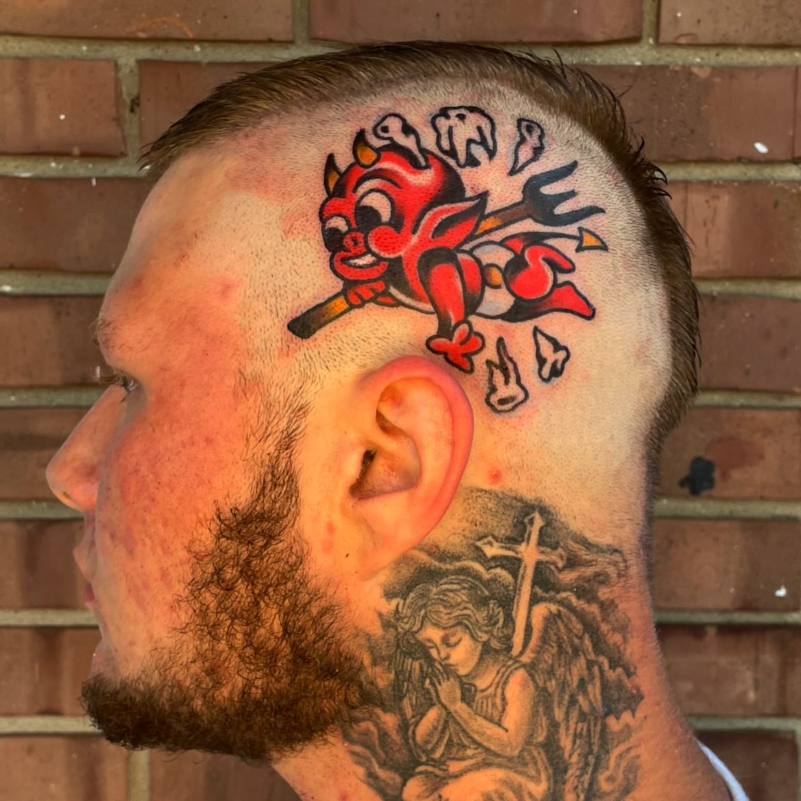 Devil and angel American traditional tattoo on the head by Nicholas M. Passeri
