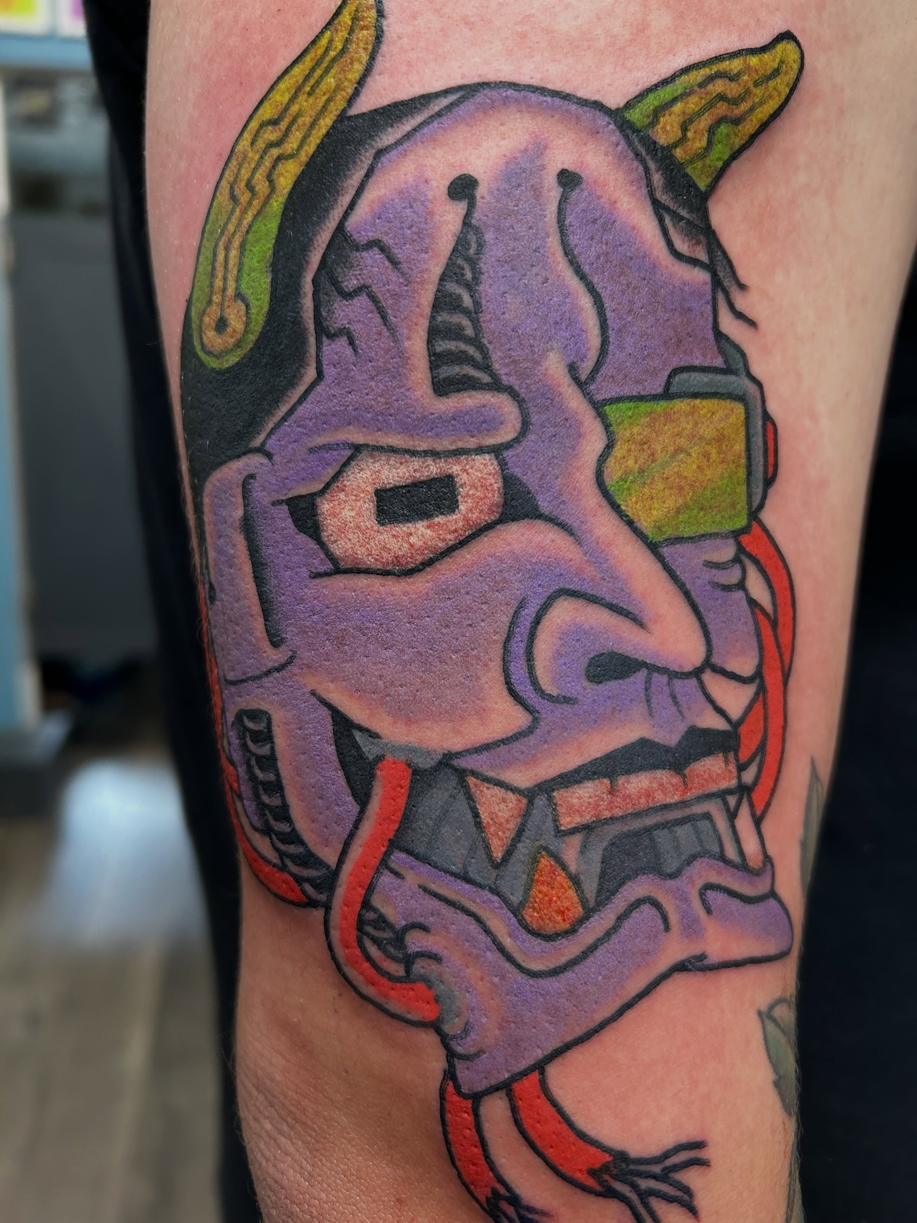 Robot head American traditional tattoo on the forearm by Mike "Yogi" Trube