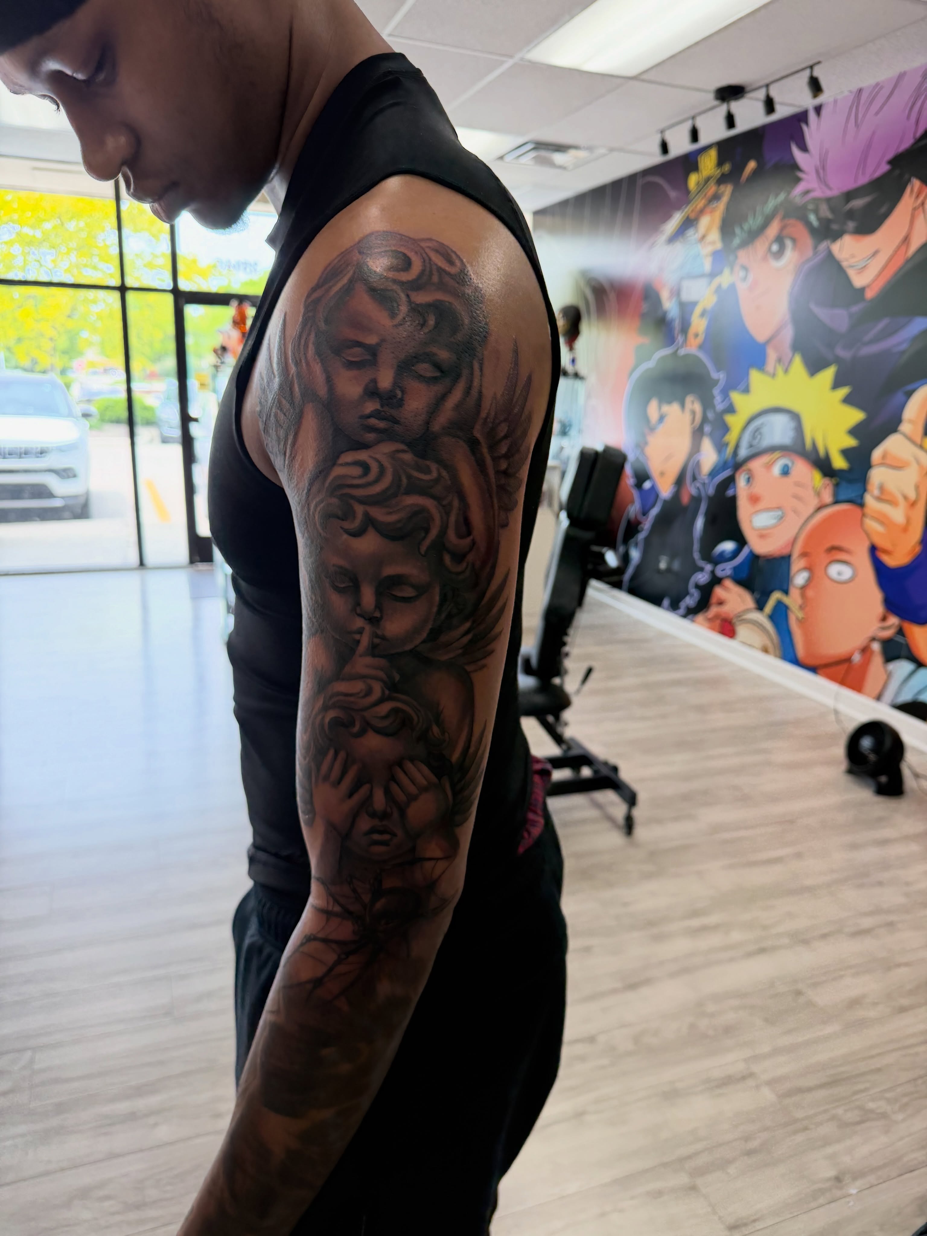 Tattoo by @3mtatts — black_and_grey, realism