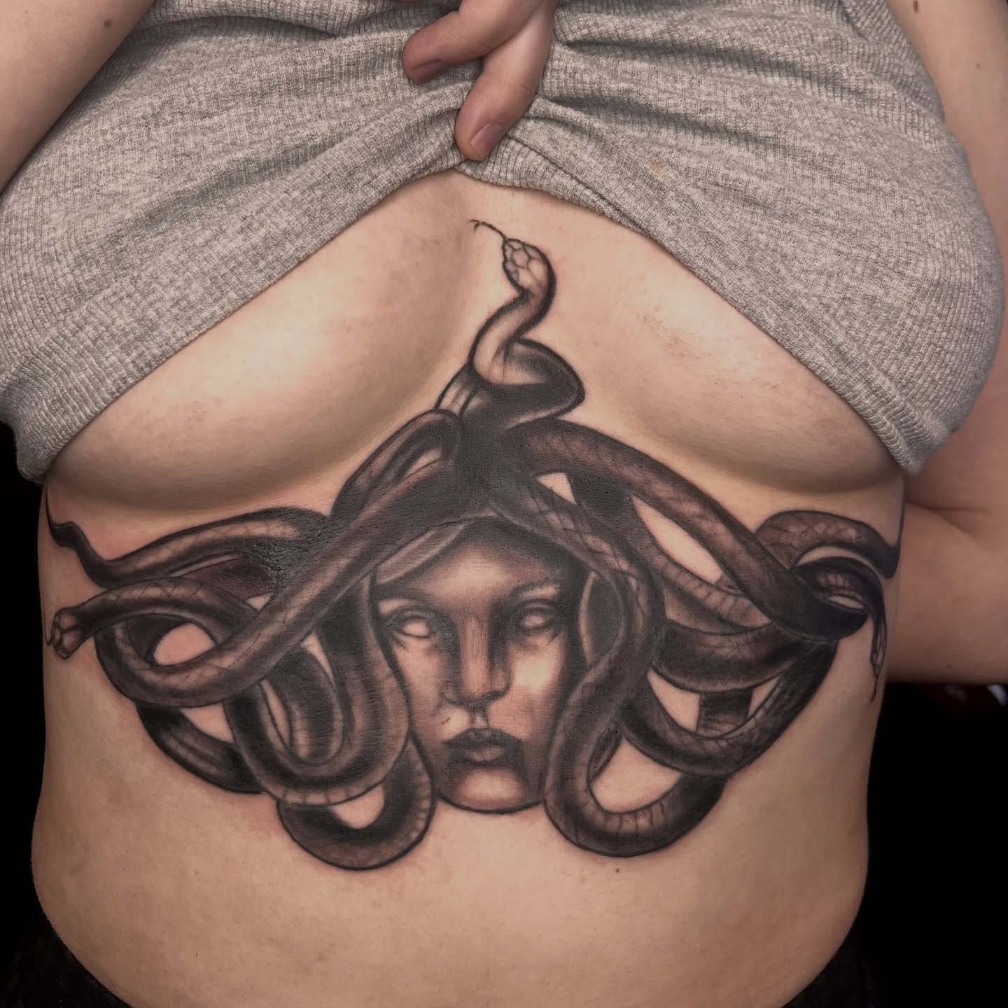 Medusa realism tattoo on the ribs by Misha Dumois, Seattle, Washington