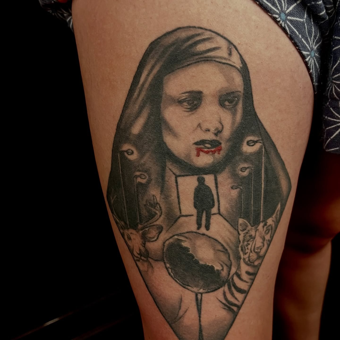 Woman with surreal elements realism tattoo on the thigh by Misha Dumois, Seattle, Washington