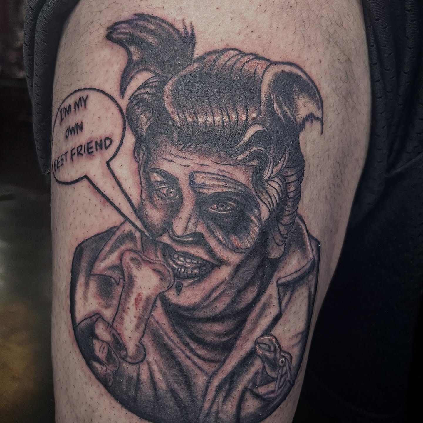 Joker black and grey tattoo on the thigh by Misha Dumois, Seattle, Washington