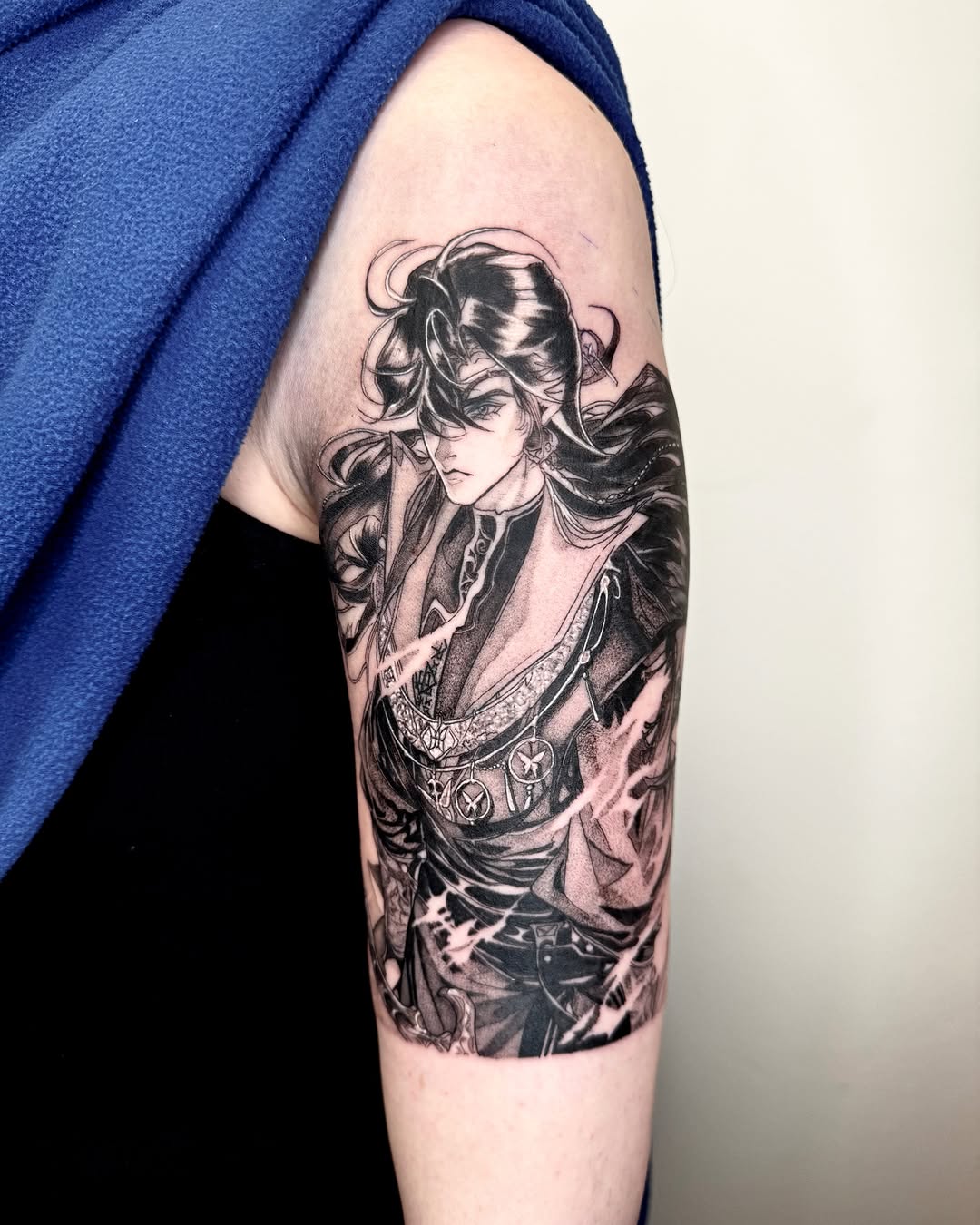 Tattoo by @emkriegart — anime, black_and_grey