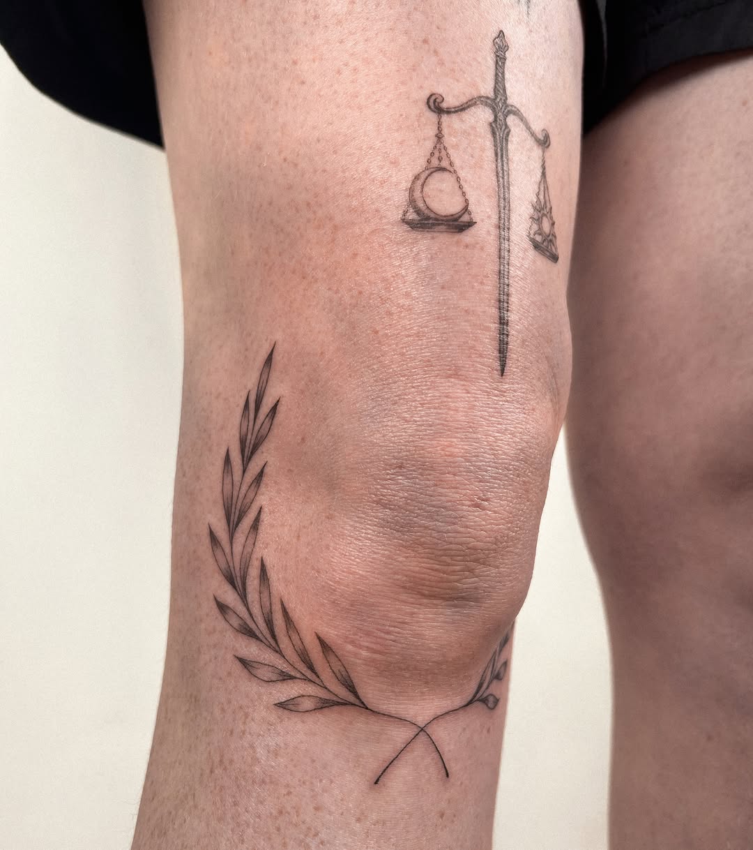 Scales of justice and laurel wreath sketch tattoo on the forearm by Helly March