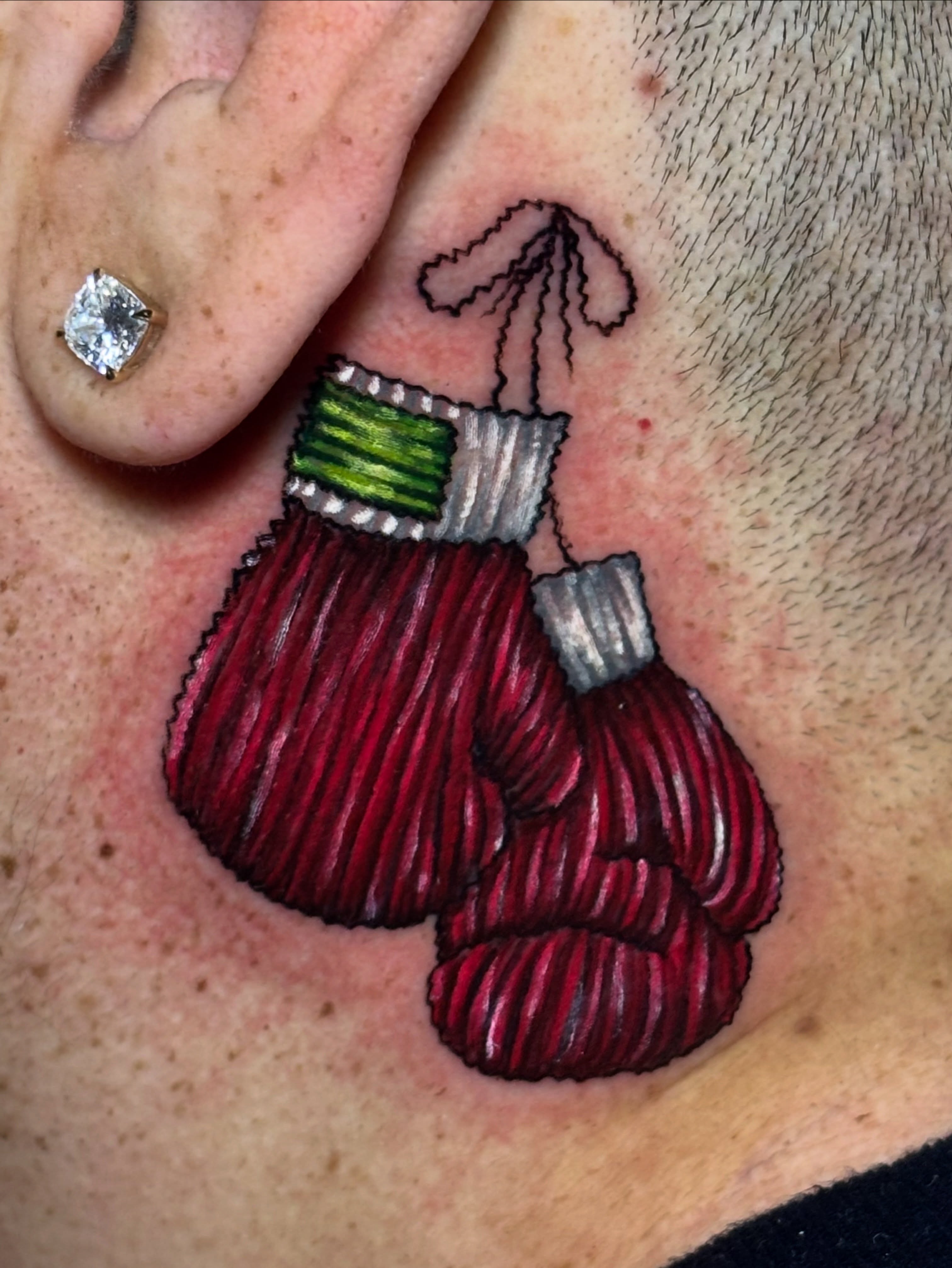 Boxing gloves realism tattoo on the neck by 𝕮𝖍𝖊𝖞𝖊𝖓𝖓𝖊