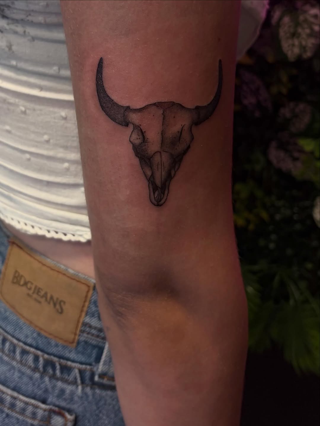 Bull skull minimalist tattoo on the forearm by Melissa