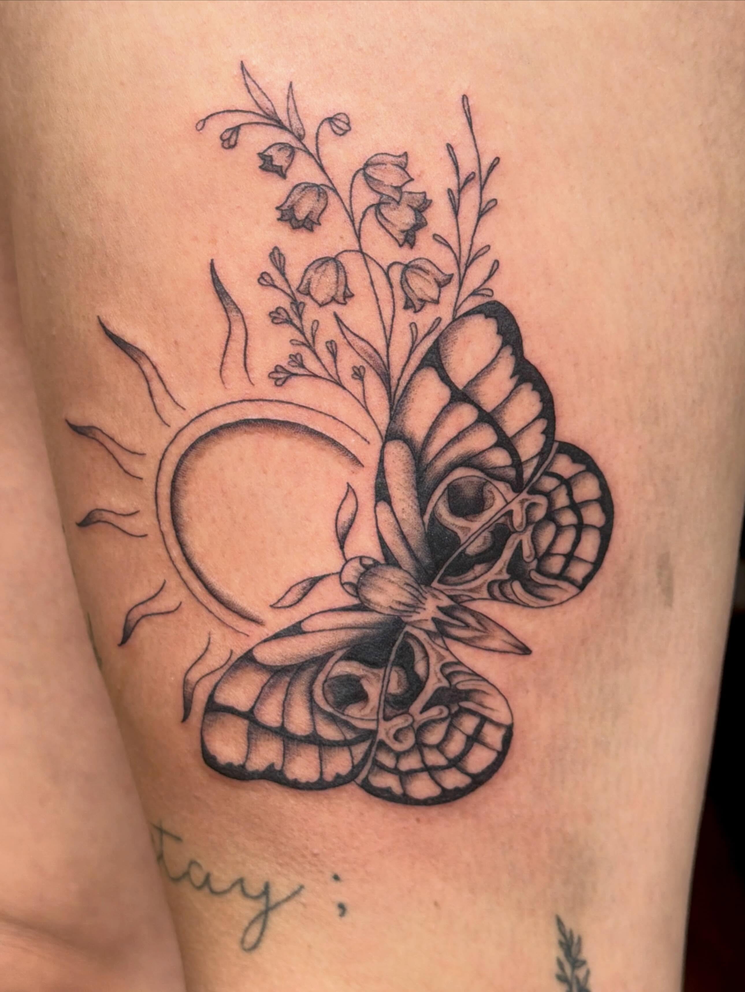 Butterfly and skull realism tattoo on the thigh by Alaska ⚜️