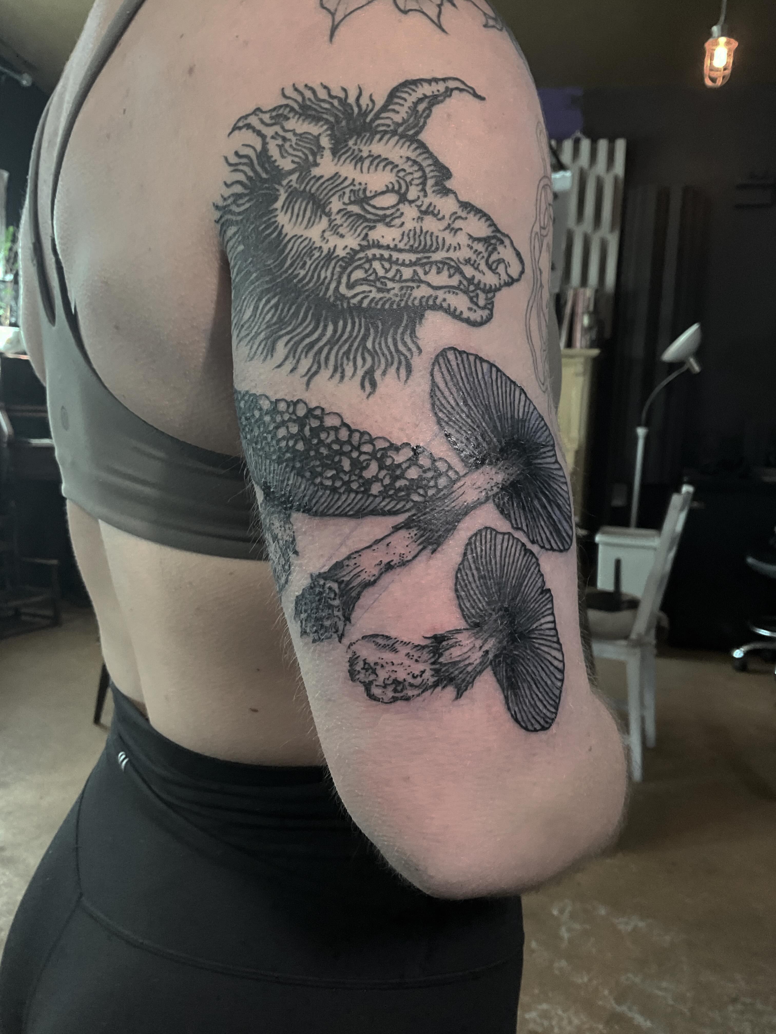 Goat head and mushrooms realism tattoo on the shoulder by ๐ญ๐๐๐๐