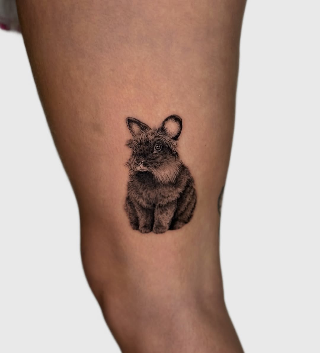 Rabbit black and grey tattoo on the leg by Miami Tattoo Artist, Miami, Florida